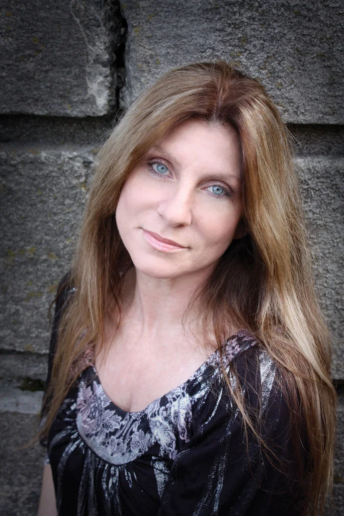Dawn's story is told in her memoir, The Road Through Wonderland: Surviving John Holmes , and the film Wonderland , in which she is portrayed by actress Kate Bosworth; John Holmes is played by Val Kilmer. Dawn was also filmed to tell her story in the 2011 Travel Channel’s Hidden Cities—The Wonderland Murders and the 2013 Investigation Discovery (ID) Channel’s Poisoned Passions—Pornstar Pedophile .