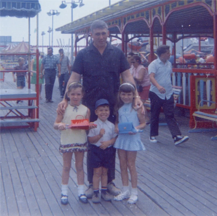 Dawn with her father, brother and sister at the New Jersey boardwalk before her dad left for Viet Nam.