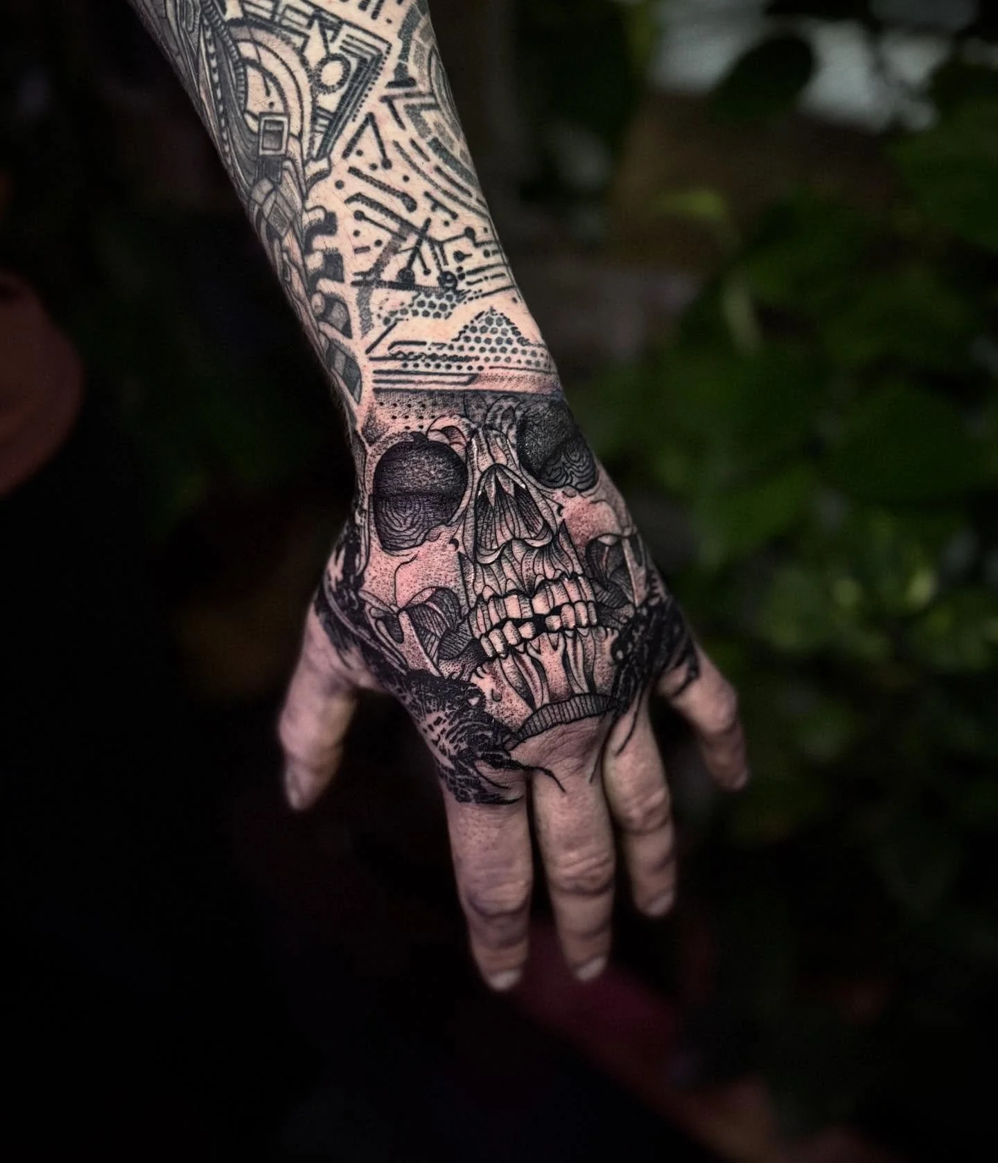 Skull hand by @dotworkboss dm direct for april bookings