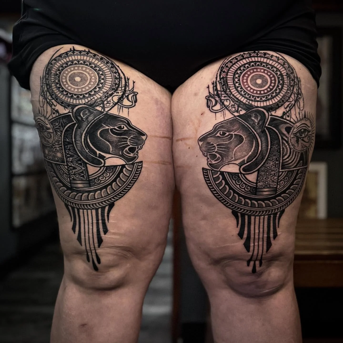 Similar designs on legs by @dotworkboss