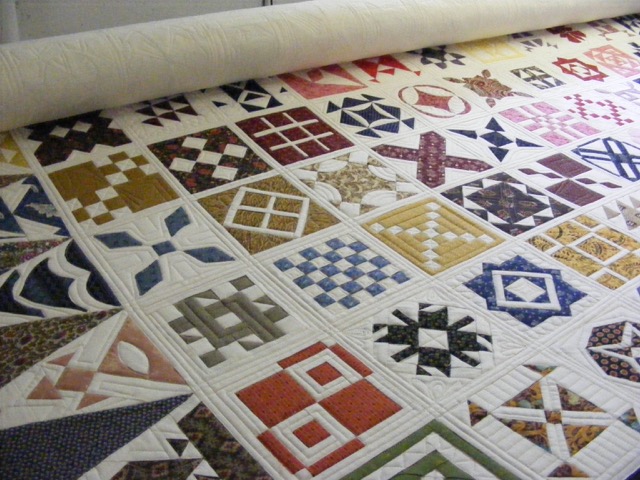 Dear Jane Quilt custom quilted by Tia Curtis