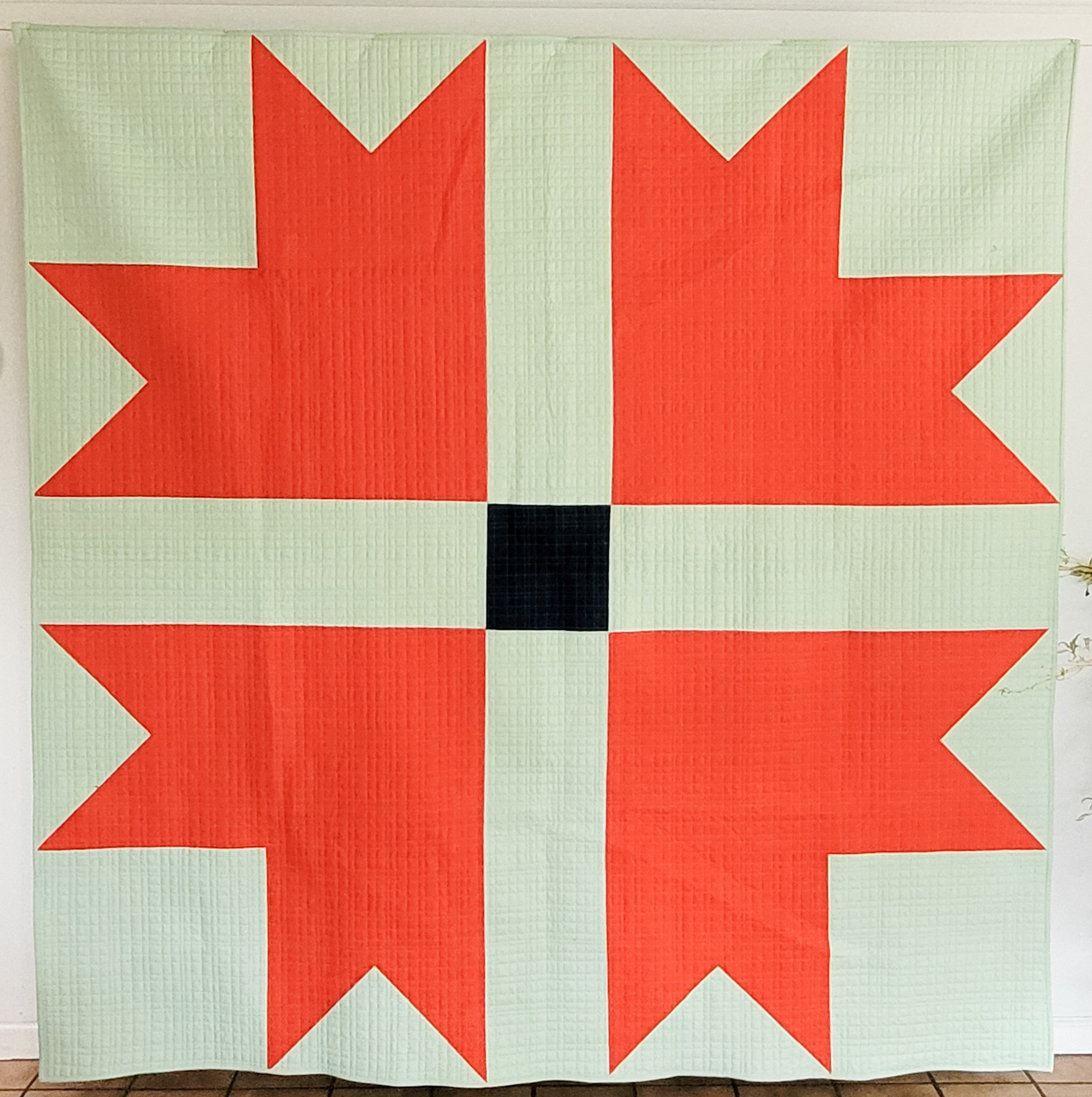 Big Cross and Crown quilt made by Tia Curtis