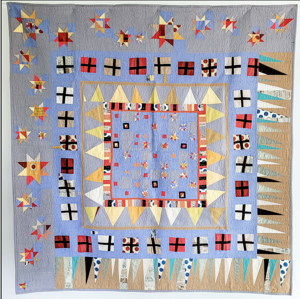 Blue Improv Medallion made by Tia Curtis in a retreat with Gwen Marston. This quilt is featured in Gwen Marston's Improv Medallions book. I quilted it on my domestic machine.