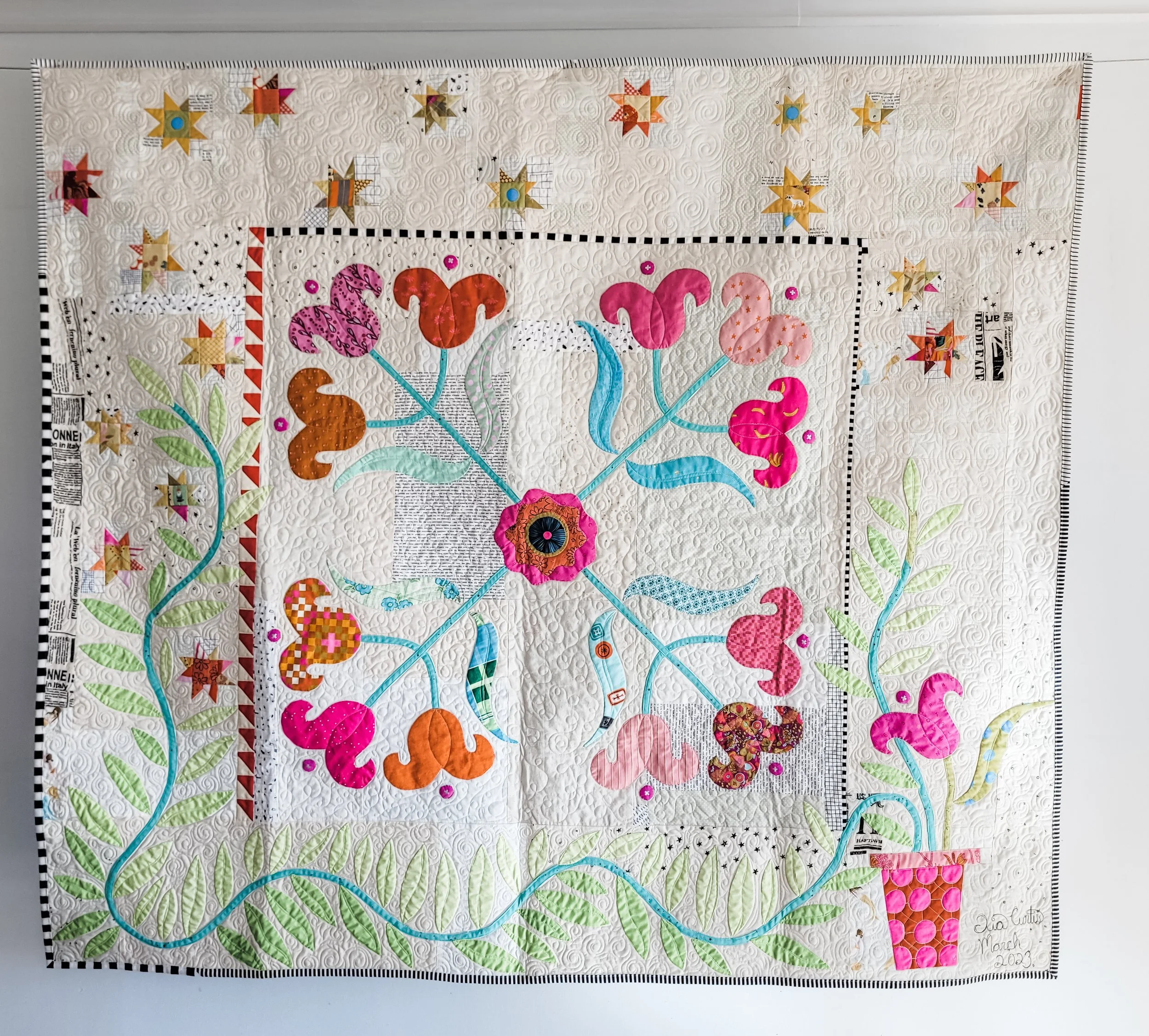 Lovely Lilies quilt made in a scrappy medallion style. Quilt made by Tia Curtis