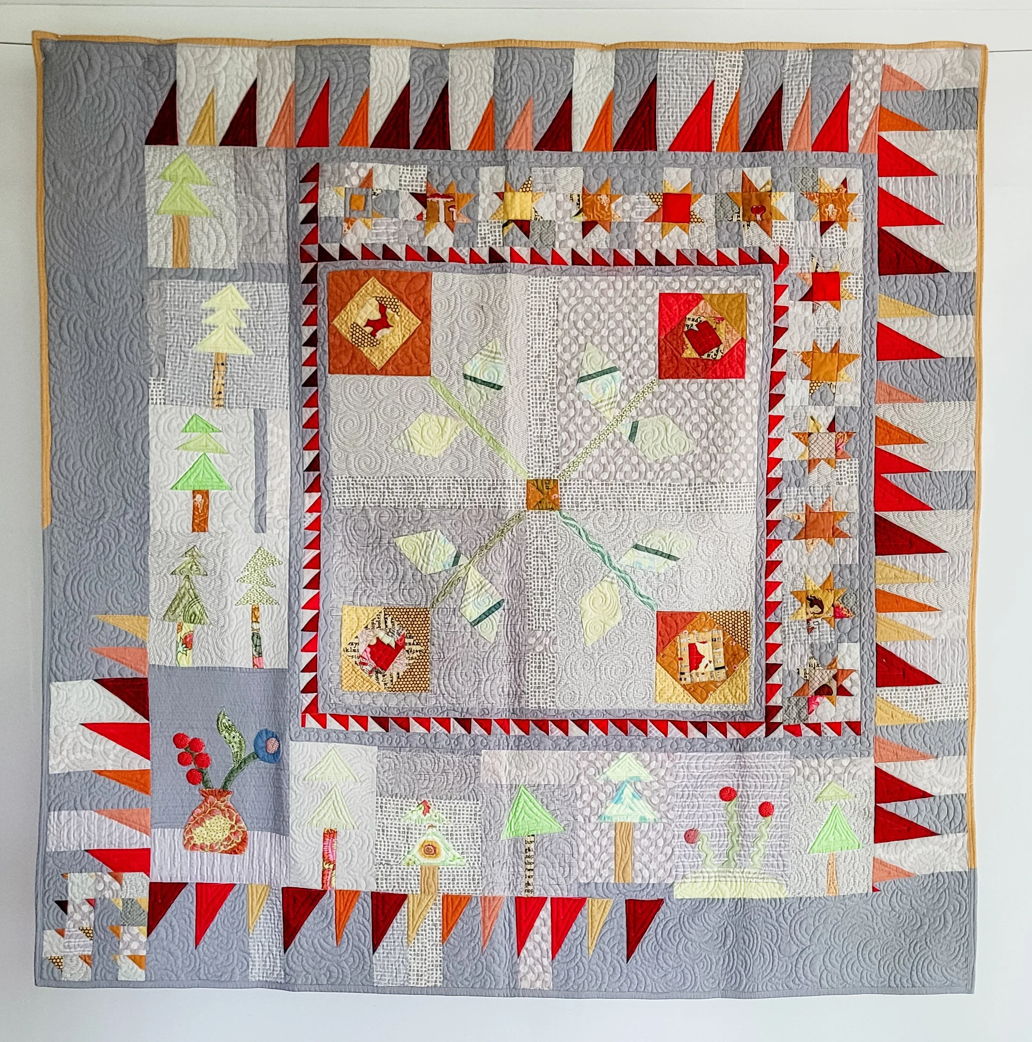 Improv Medallion with scrap fabric made by Tia Curtis and quilted on my longarm