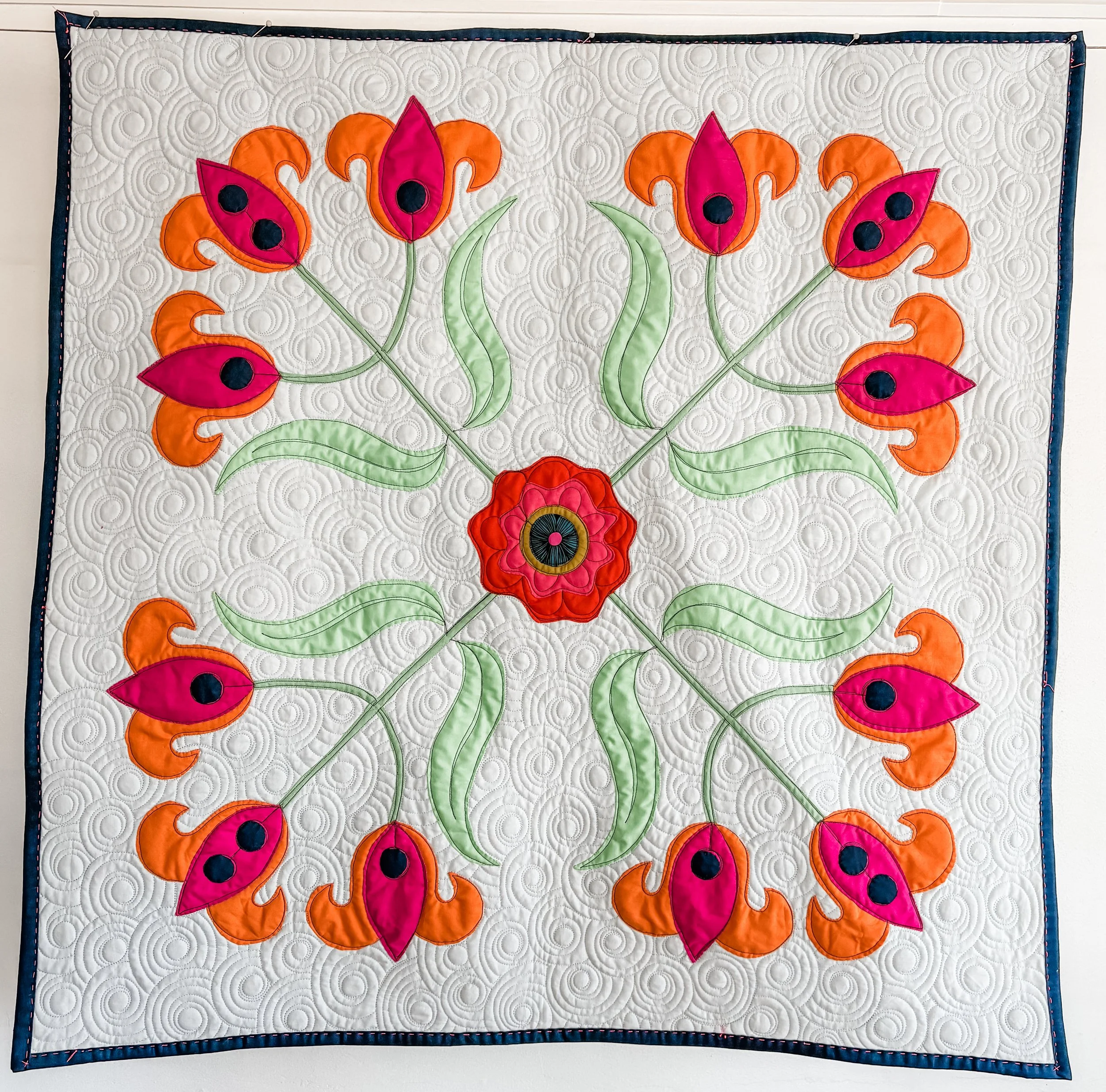 Lovely Lilies quilt as a wallhanging made by Tia Curtis