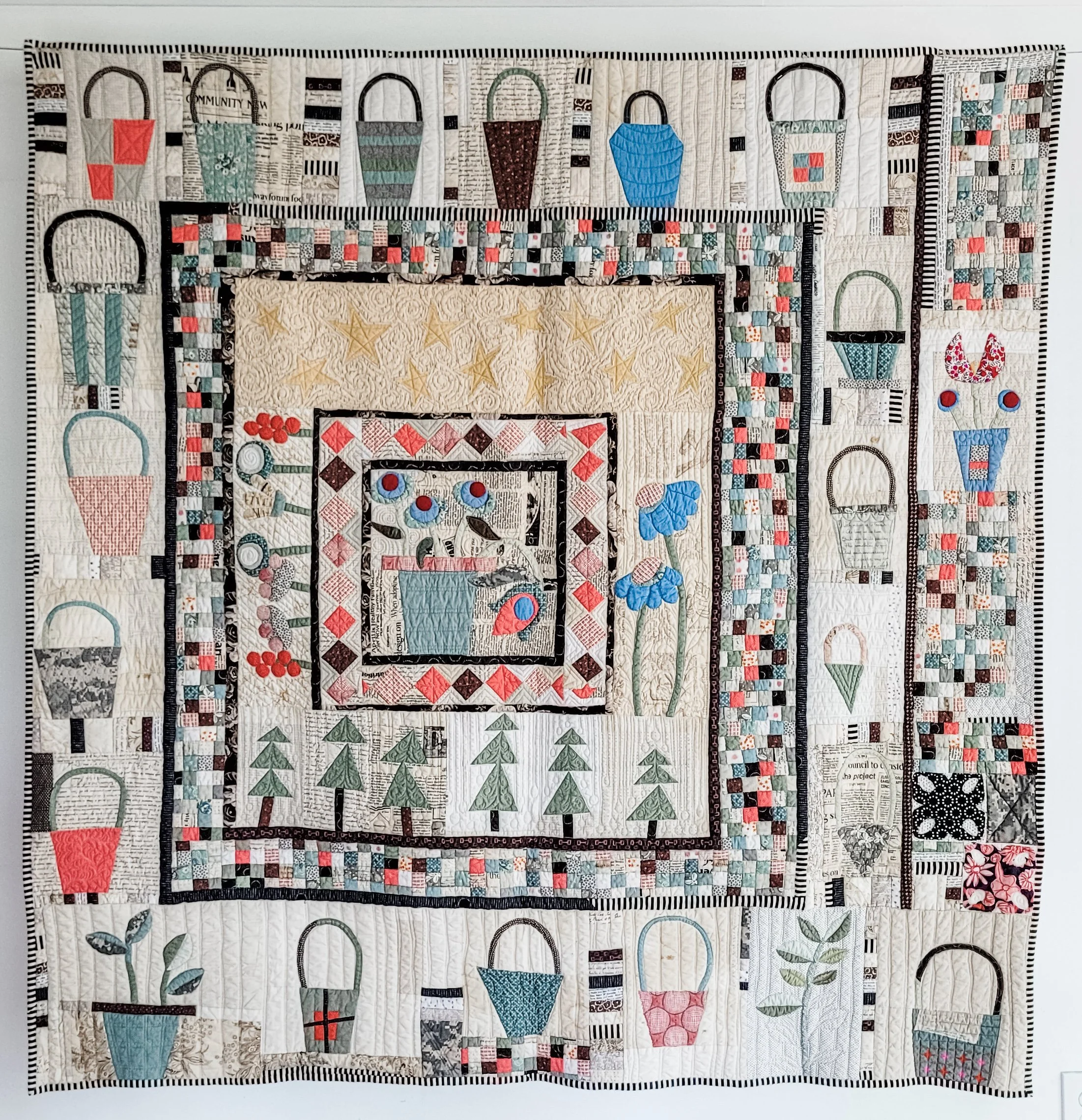 Improv Basket Medallion quilt made by Tia Curtis in a workshop with Gwen Marston. Custom Quilted on my longarm.