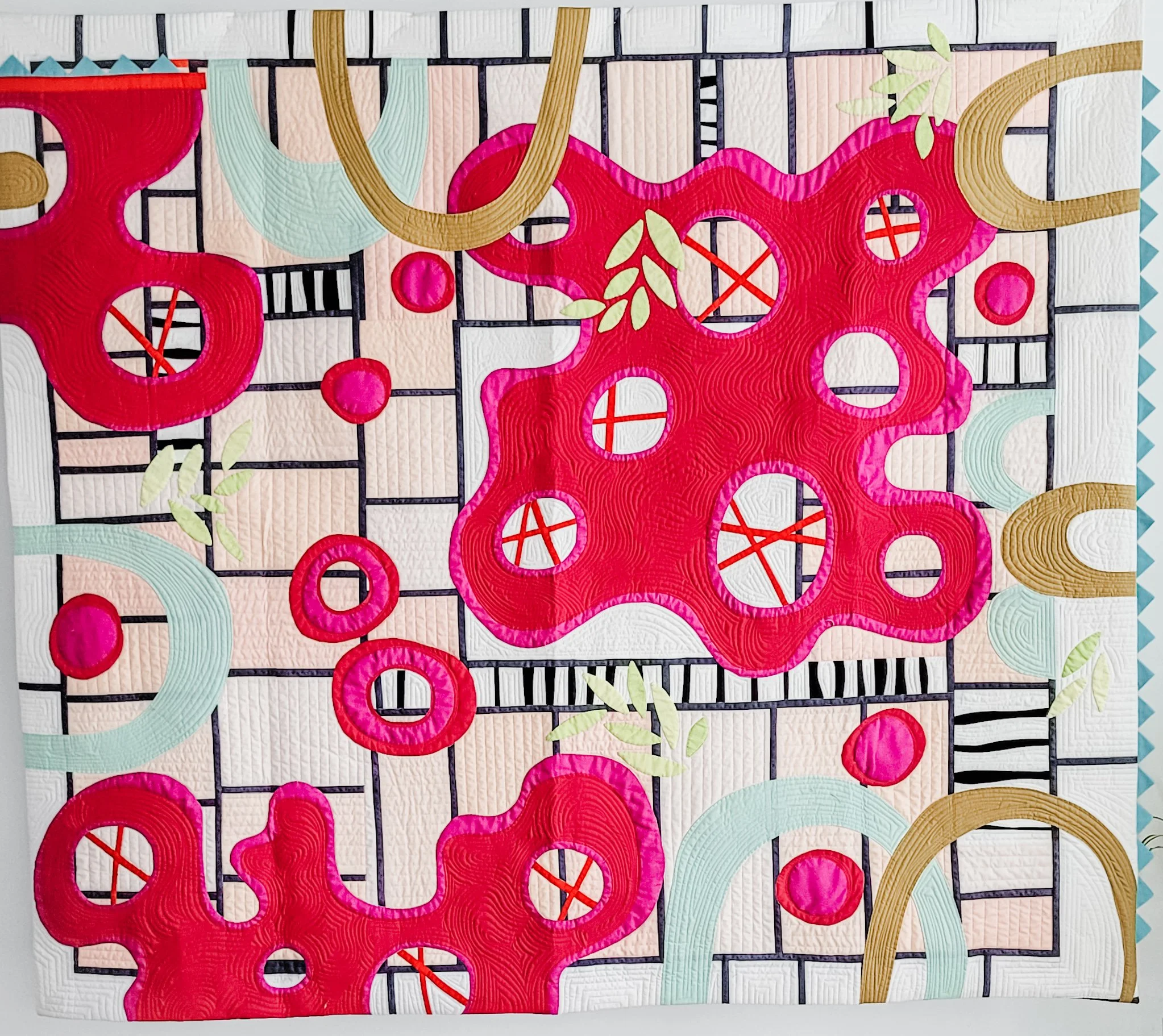 All the Ideas and once by Tia Curtis. This piece was the second in my study of large scale applique basted on my longarm. I wanted to try the technique on a pieced background. It was custom quilted on my longarm.