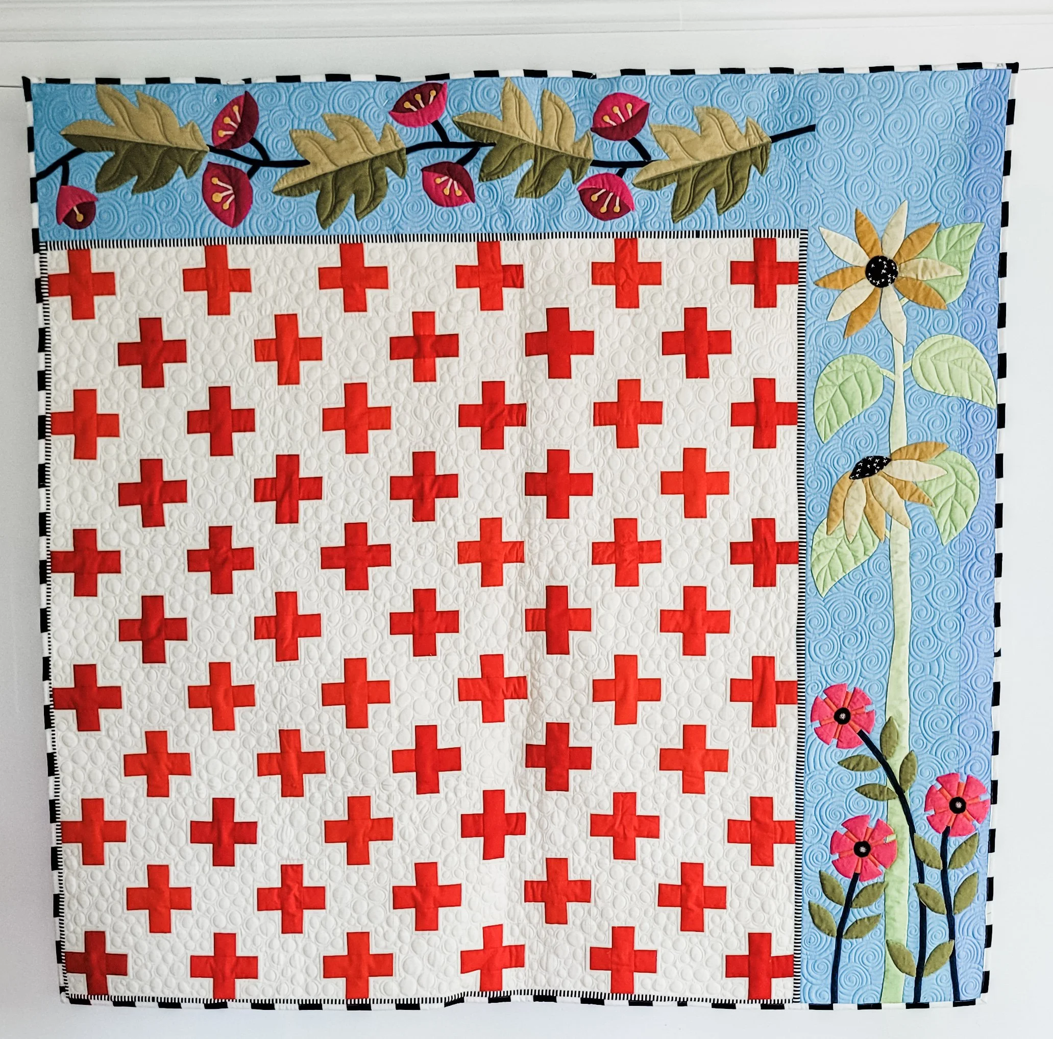 Covid quilt #2 by Tia Curtis. My garden thrived during the shutdown and I considered returning to work as a nurse. I custom quilted it on my longarm