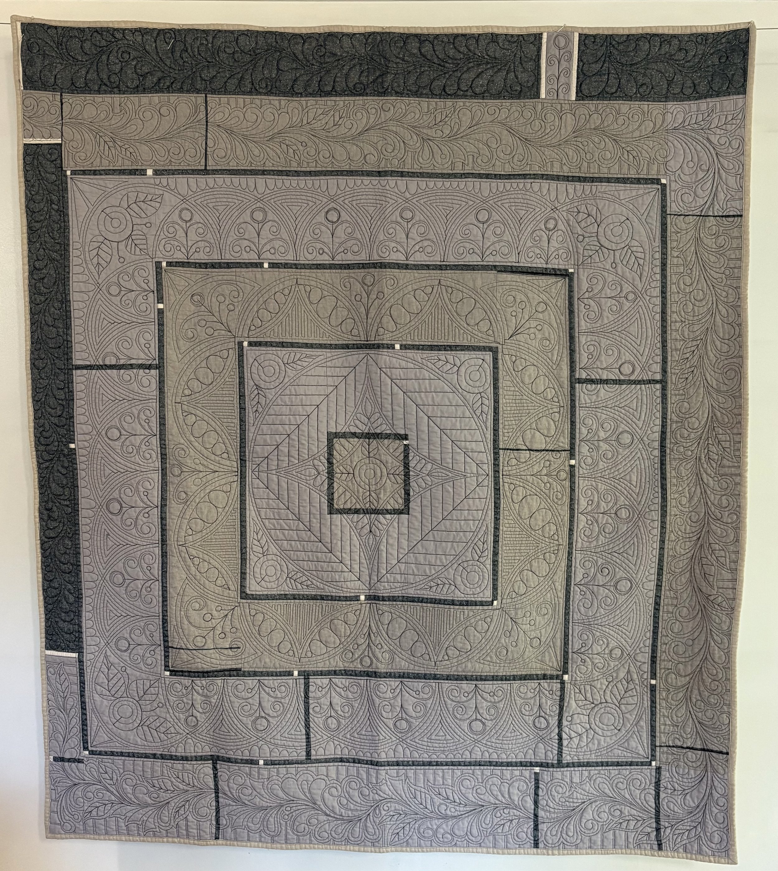 Welsh Berry Jam Quilt made by Tia Curtis. Instead of using strip sets I used solid Essex linen and quilted the quilt with Welsh style quilting and fun feathers.