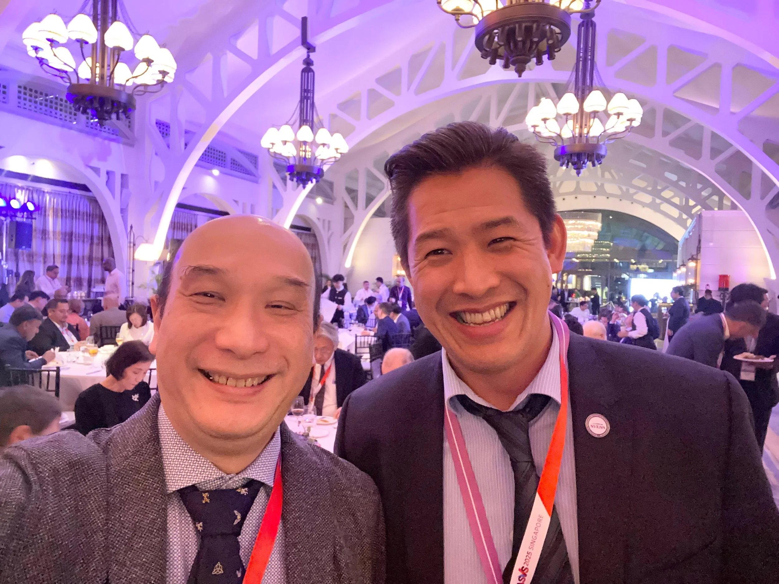 Reconnecting with a colleague at the ASVS 2025 gathering