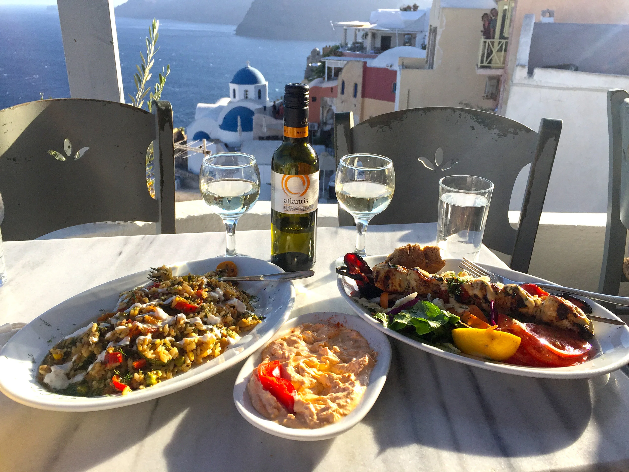 Get a bottle of wine and a couple side dishes to share - cuts costs and is just as delicious!