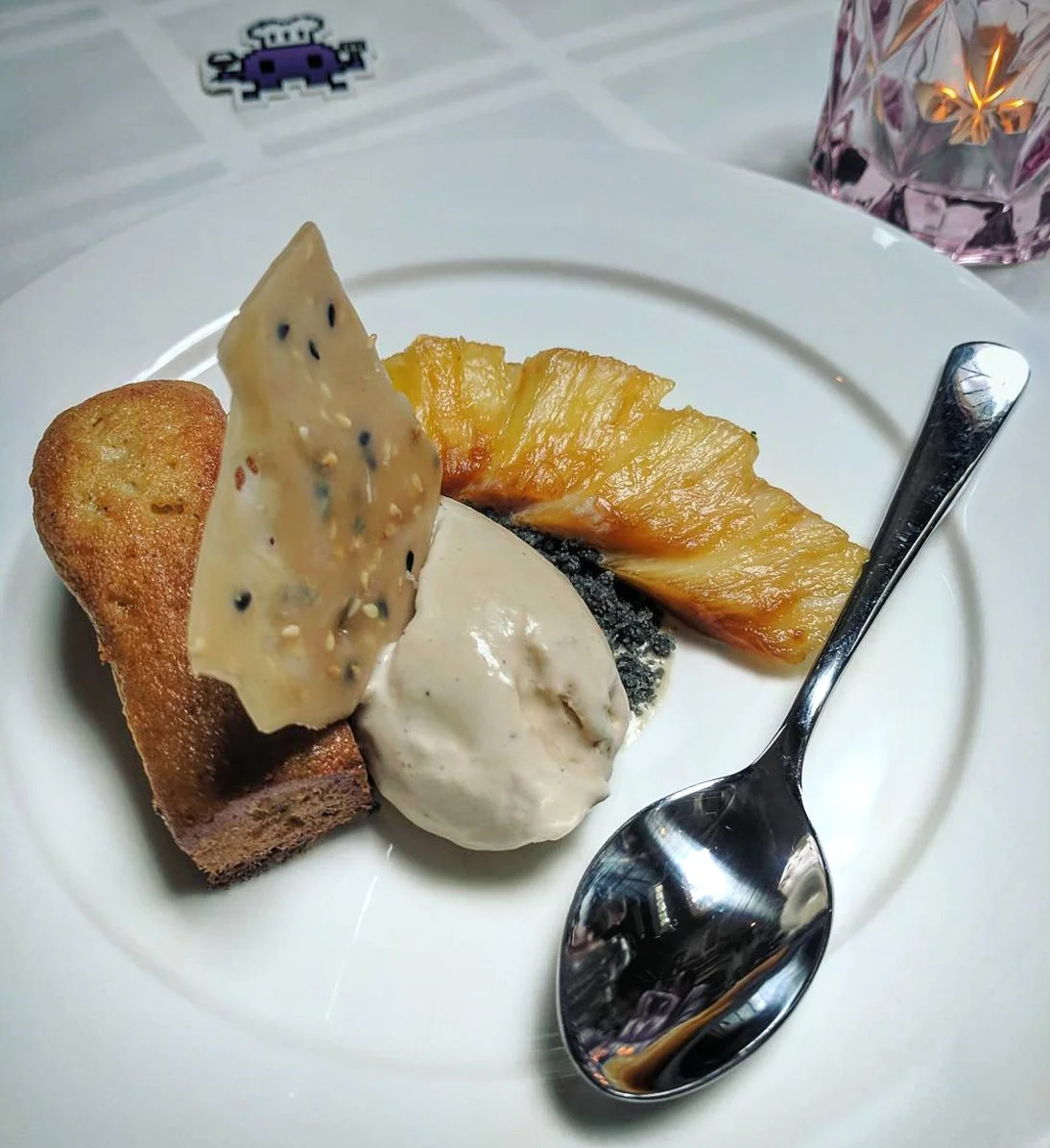 Final course (dessert): Nutmeg cake with sesame brittle, star anise-roasted pineapple and black pepper-palm ice cream. VIA PLACEINVADERS