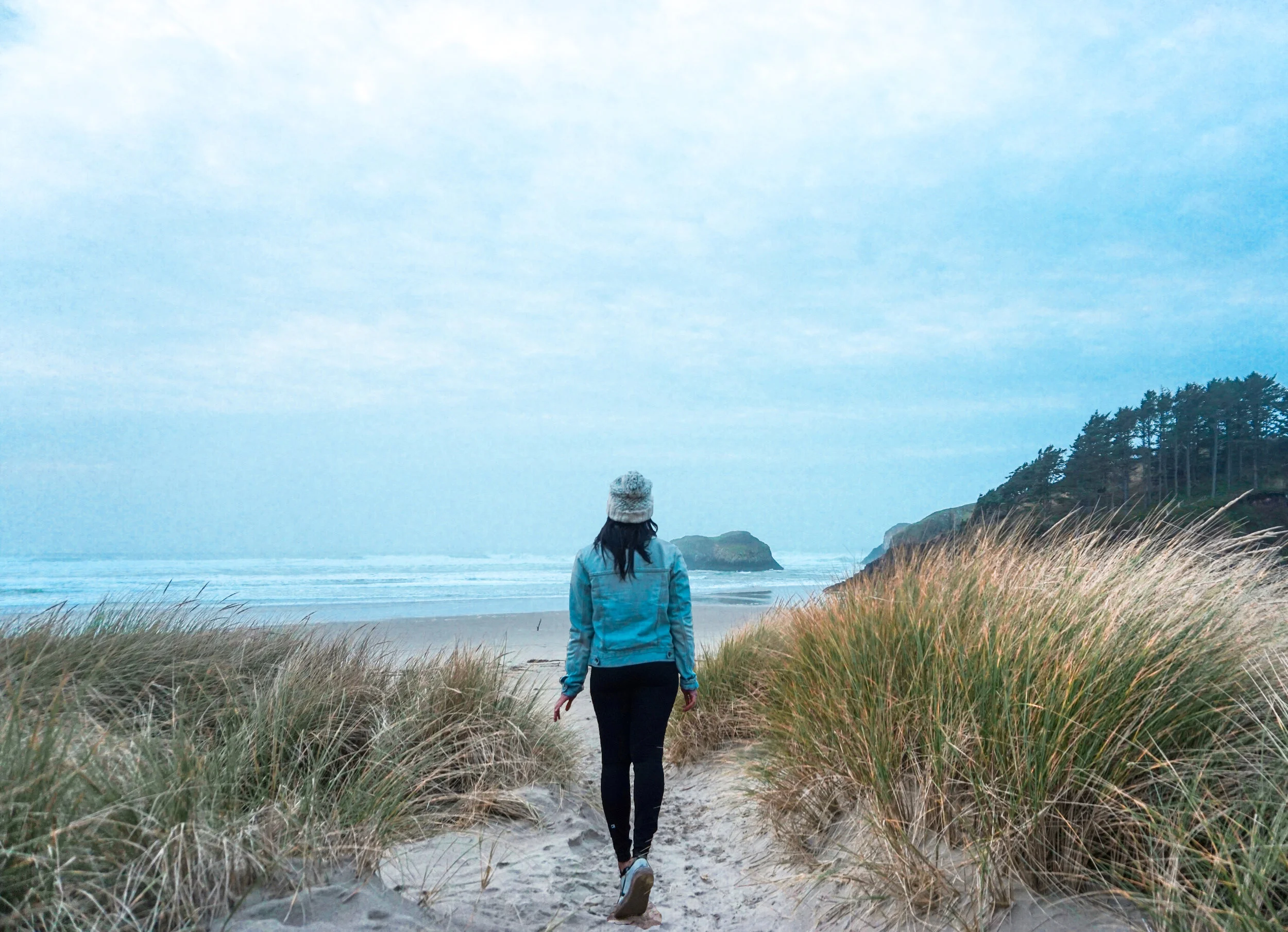 Walking along the beach near Ecola State Park