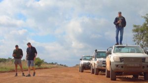 ERP elephant monitor with reserve management staff, waiting for an update from the ERP elephant collar. This was the last road which the elephants needed to cross before getting back to the reserve. We were all waiting in anticipation.
