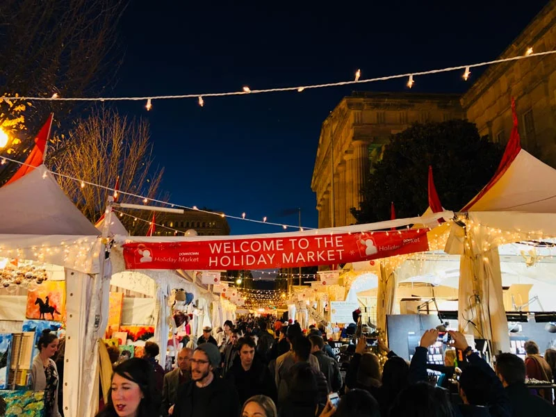 evening-shopping-at-the-downtown-holiday-market_ddc-photo.jpg