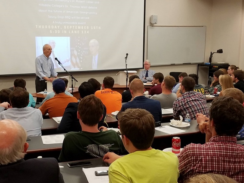PHOTO: The debate between professors West and Lieber (Josh Paladino/Collegian)