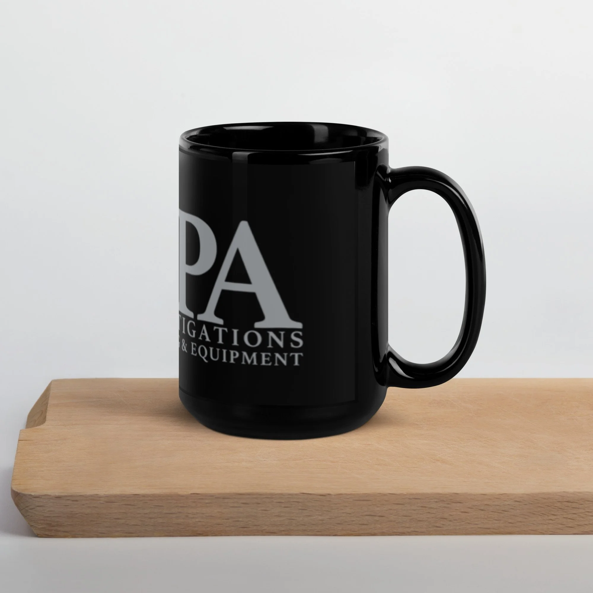 black-glossy-mug-black-15oz-handle-on-right-63a46c343ce12.jpg