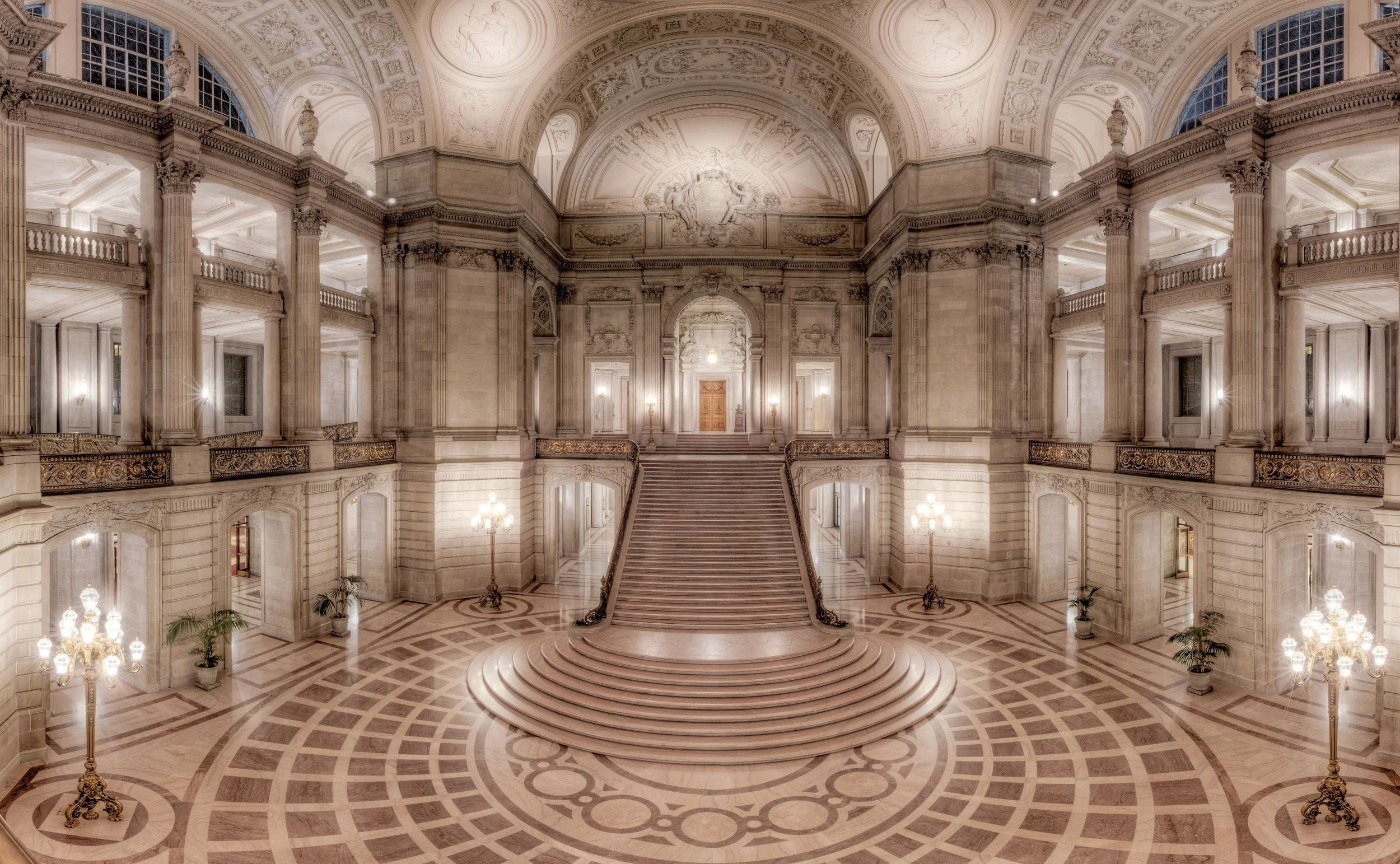 Symmetry of Power

 

 San Francisco City Hall serves as the seat of city government and is one of the city’s best-known Beaux-Arts buildings. Its monumental interior includes the grand staircase and rotunda shown here. 