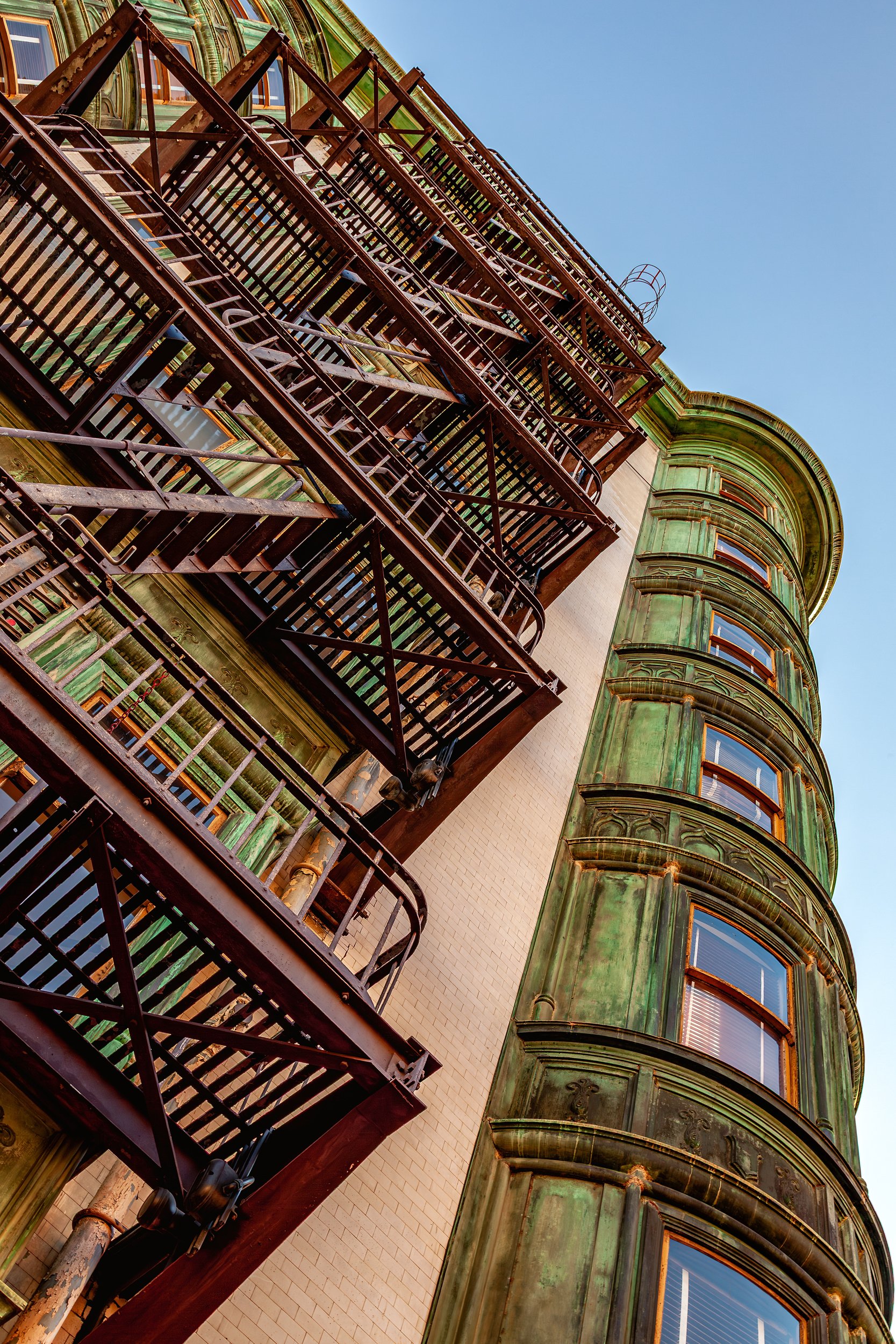 Columbus Tower on Kearny Street

 

 Columbus Tower stands at 916 Kearny Street in San Francisco, near the edge of the Financial District and North Beach. The landmark building is known for its green copper façade, rounded corner, narrow profile, and