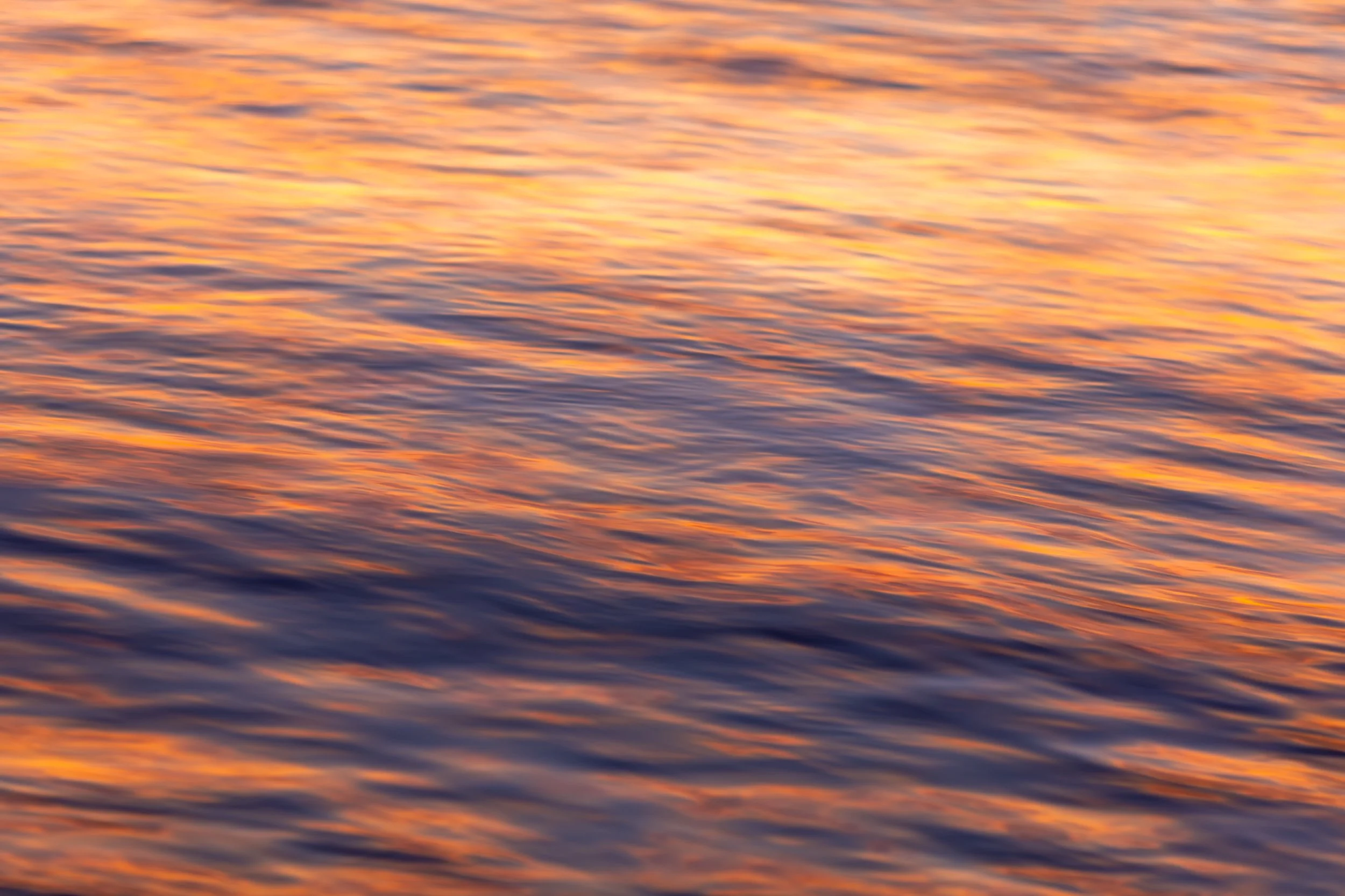 Palauea Beach Water Light

 

  This abstract seascape was made at Palauea Beach Park on Maui. Warm reflected light and moving water appear without a visible shoreline or horizon. 