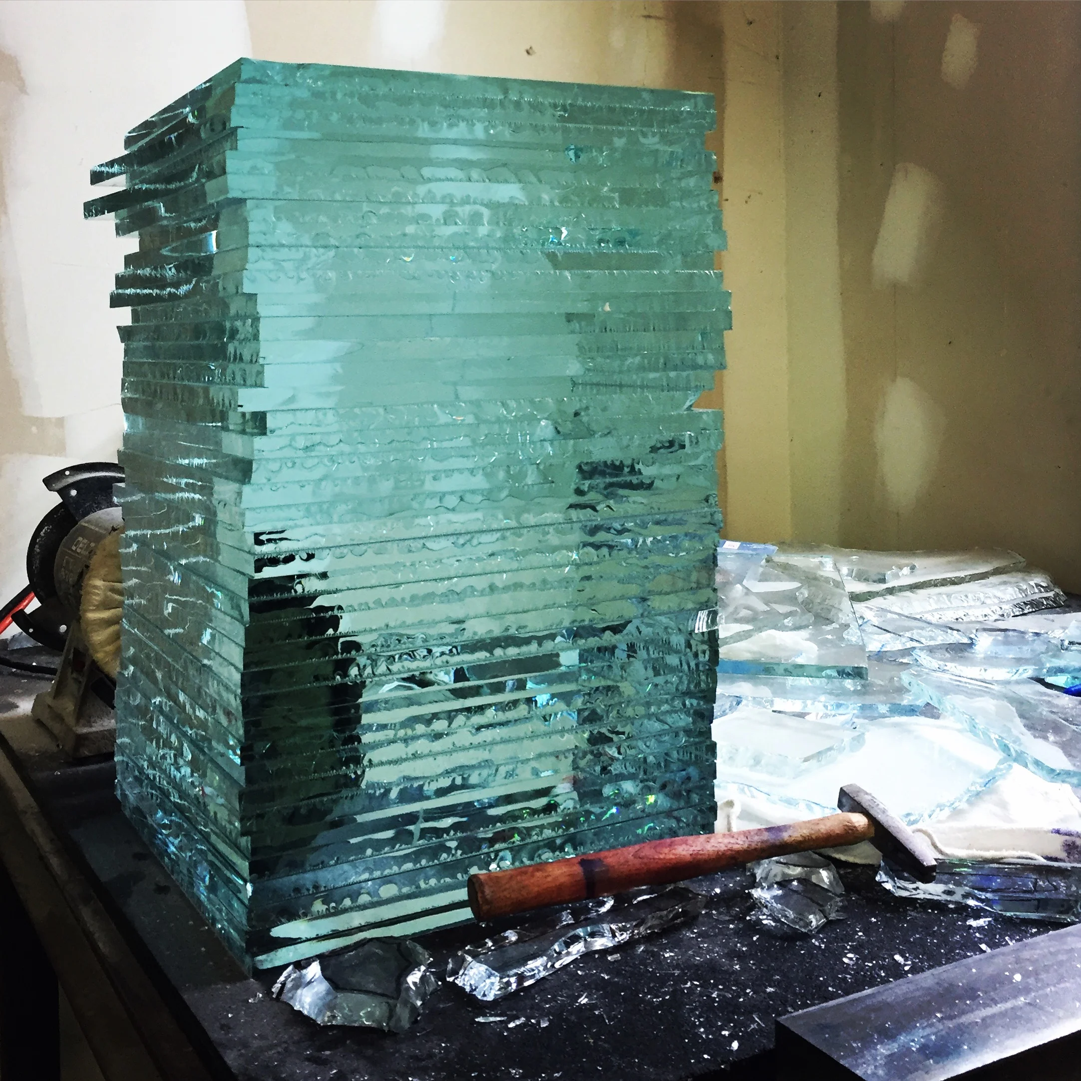 Chiseling the glass plates so that we can stain them