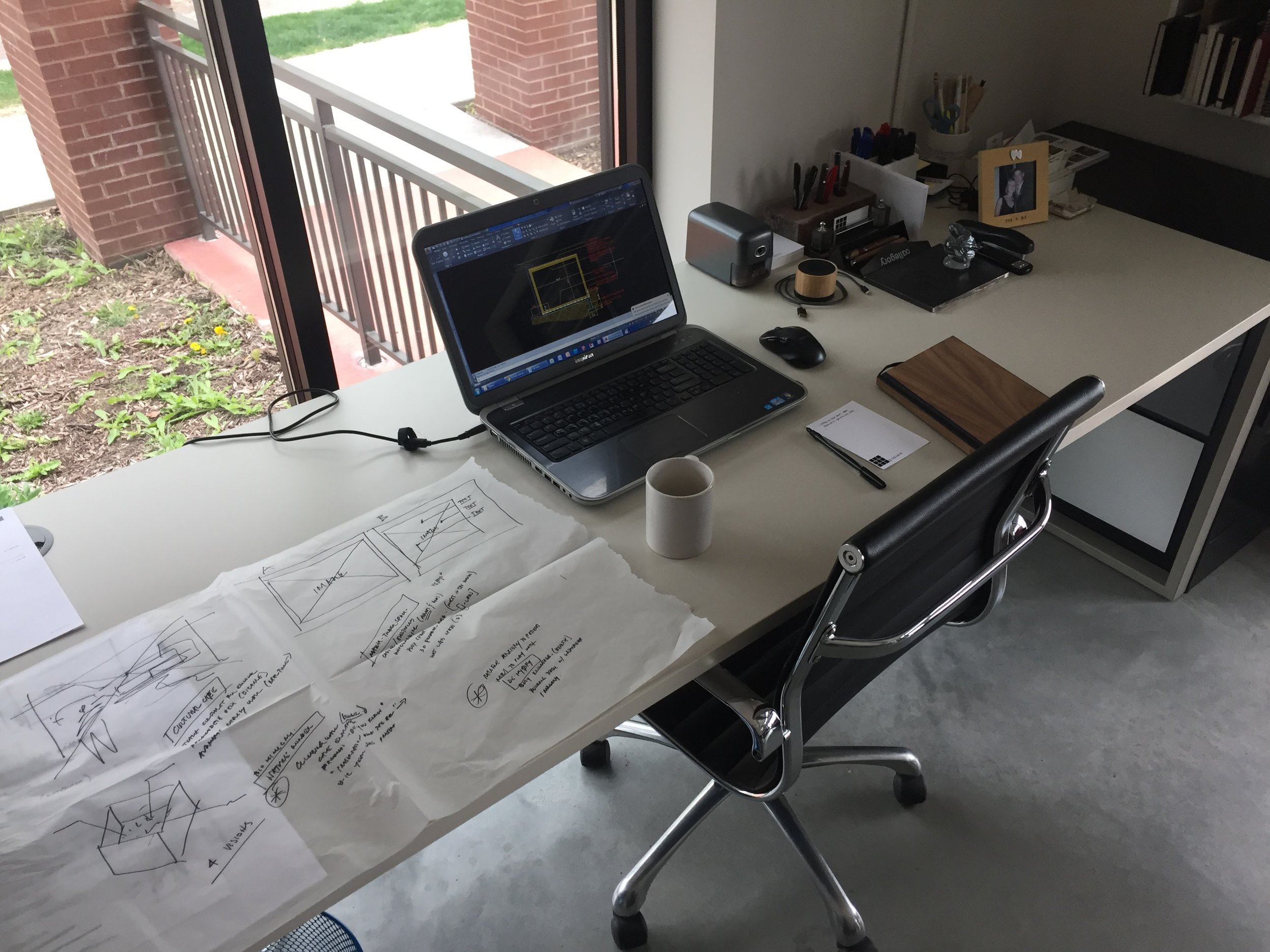 Desk of Adam Ferrari, Architect at 9.square.