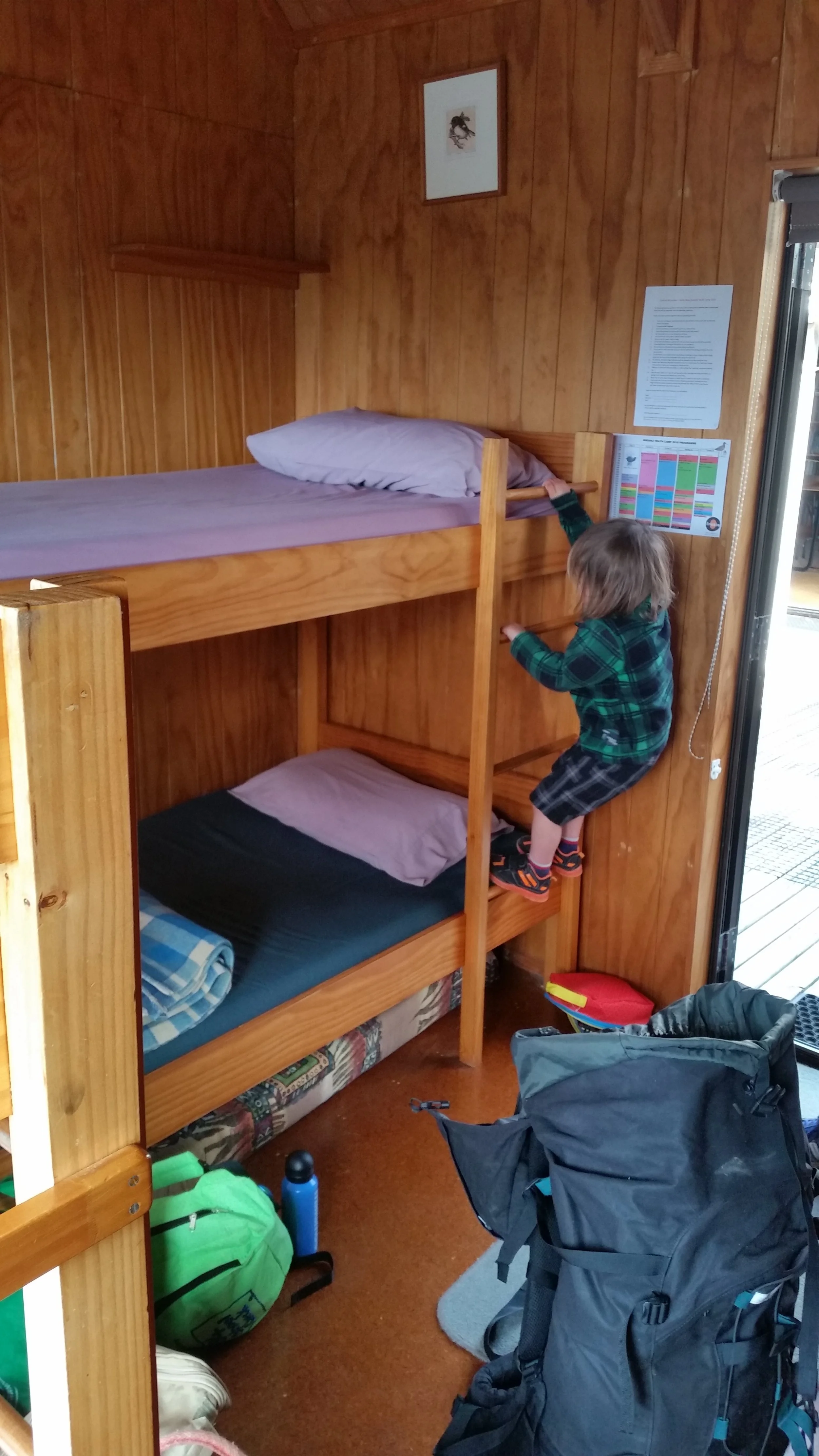 Luke trying to lay claim to the top bunk