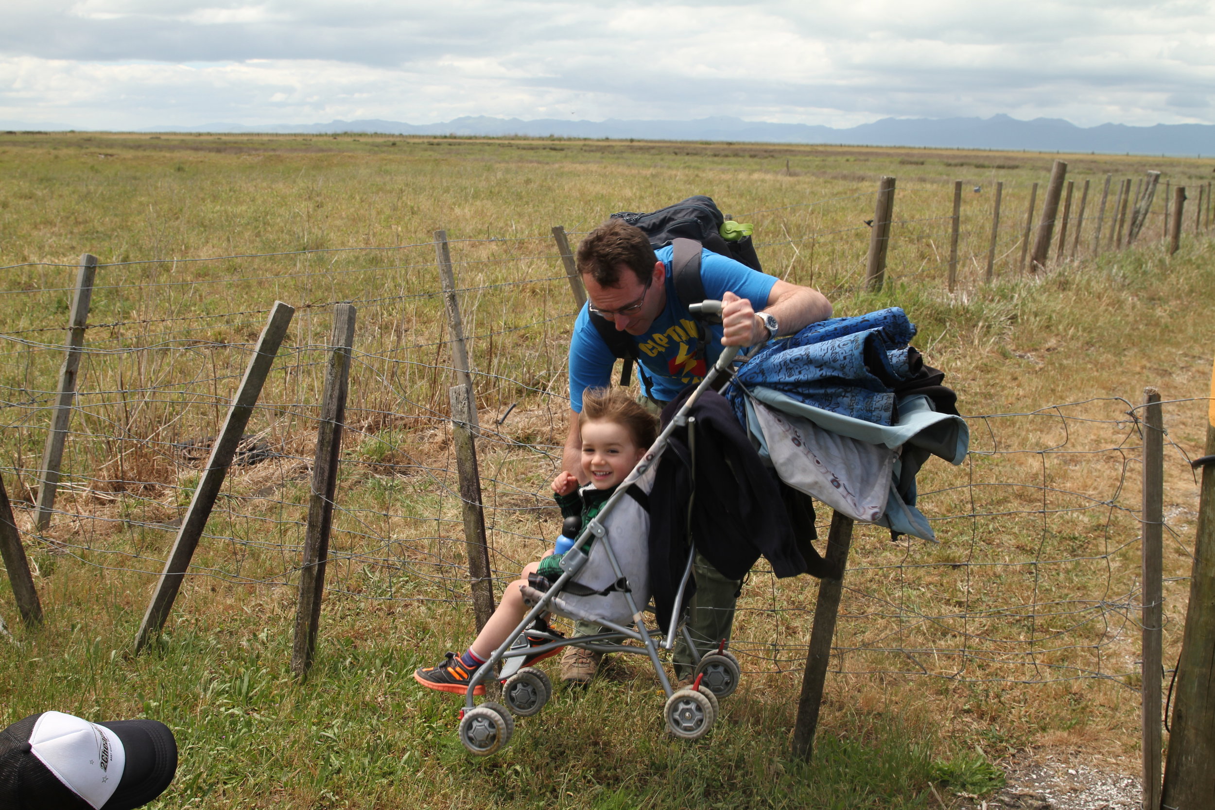Lifting Luke over a fence