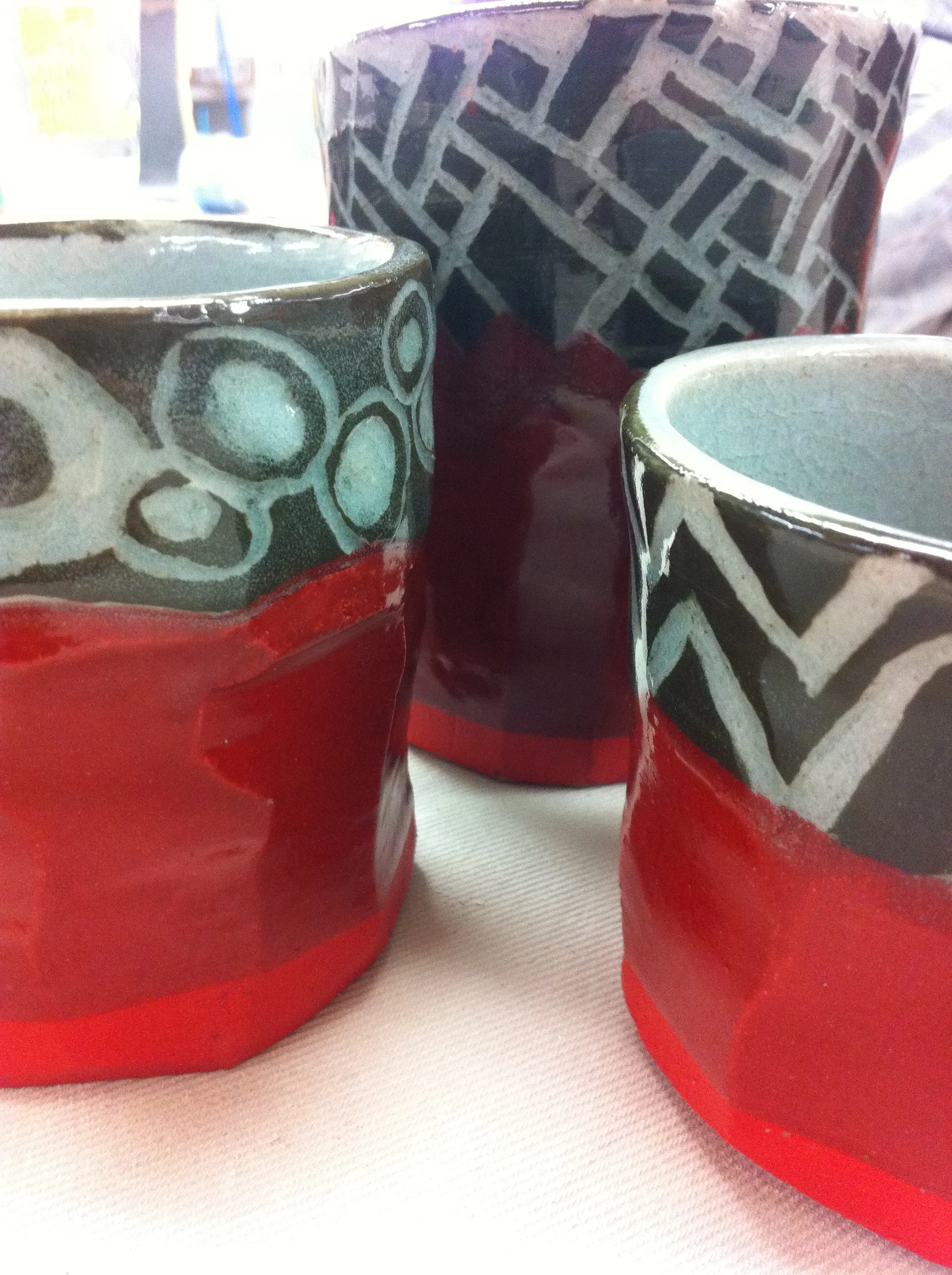 Trio of cups in red