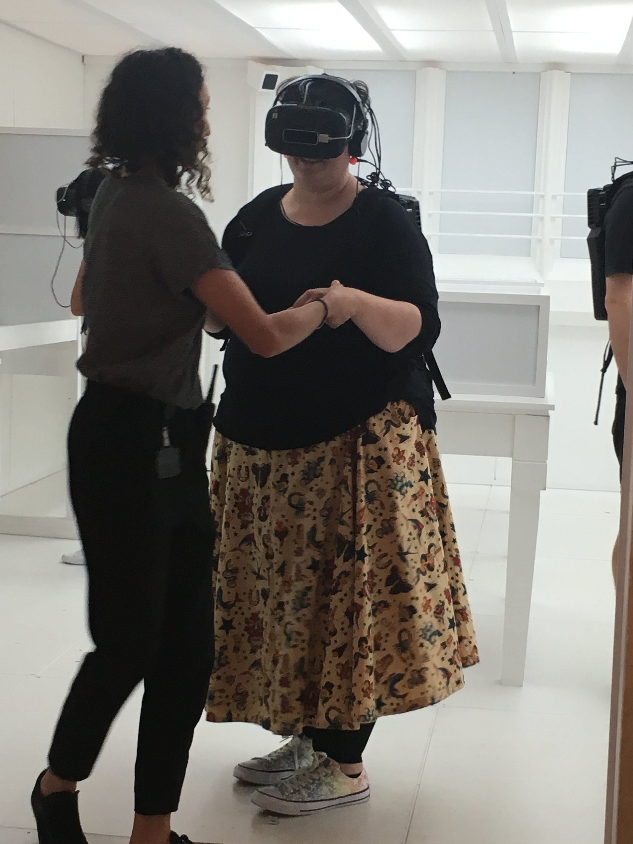 Nicola at Matt Collishaw show in full VR gear and wearing that tricky pattern matched skirt I made