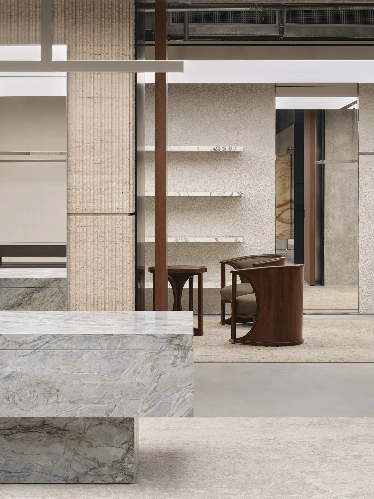 Saint Laurent flagship interior with marble display plinth and timber framing