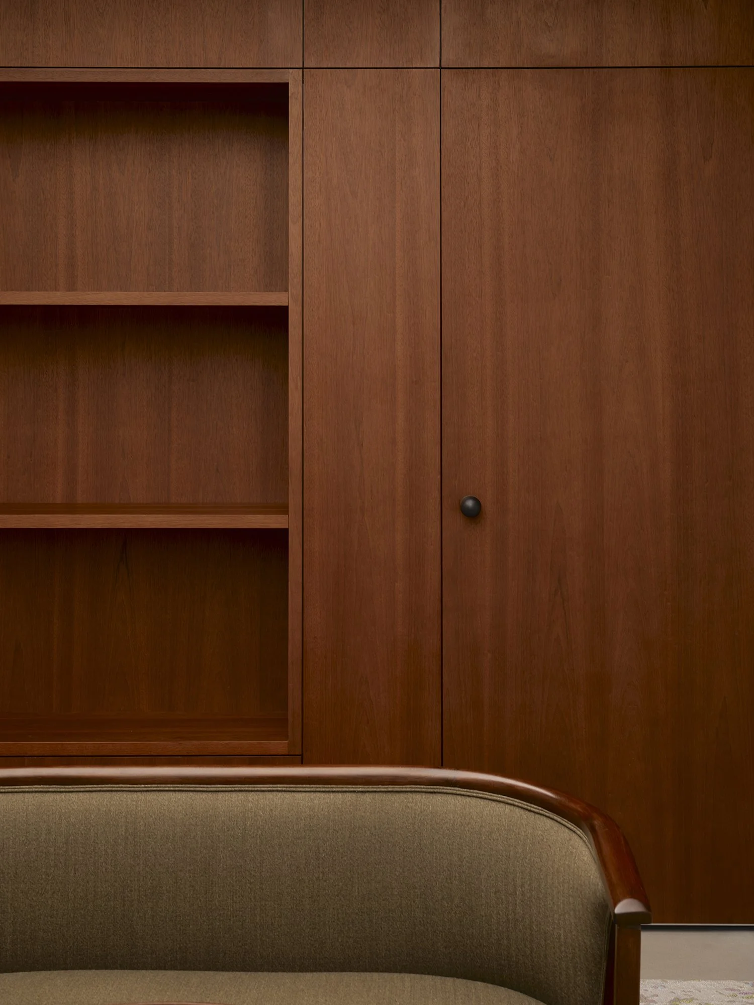 Retail interior photography detail of Saint Laurent’s wood cabinetry