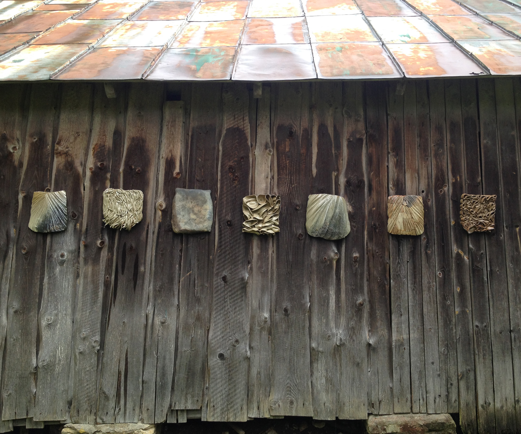 Texture Studies 1-7, wheel thrown and hand build wall hanging objects, wood fired in Anagama kiln. 
