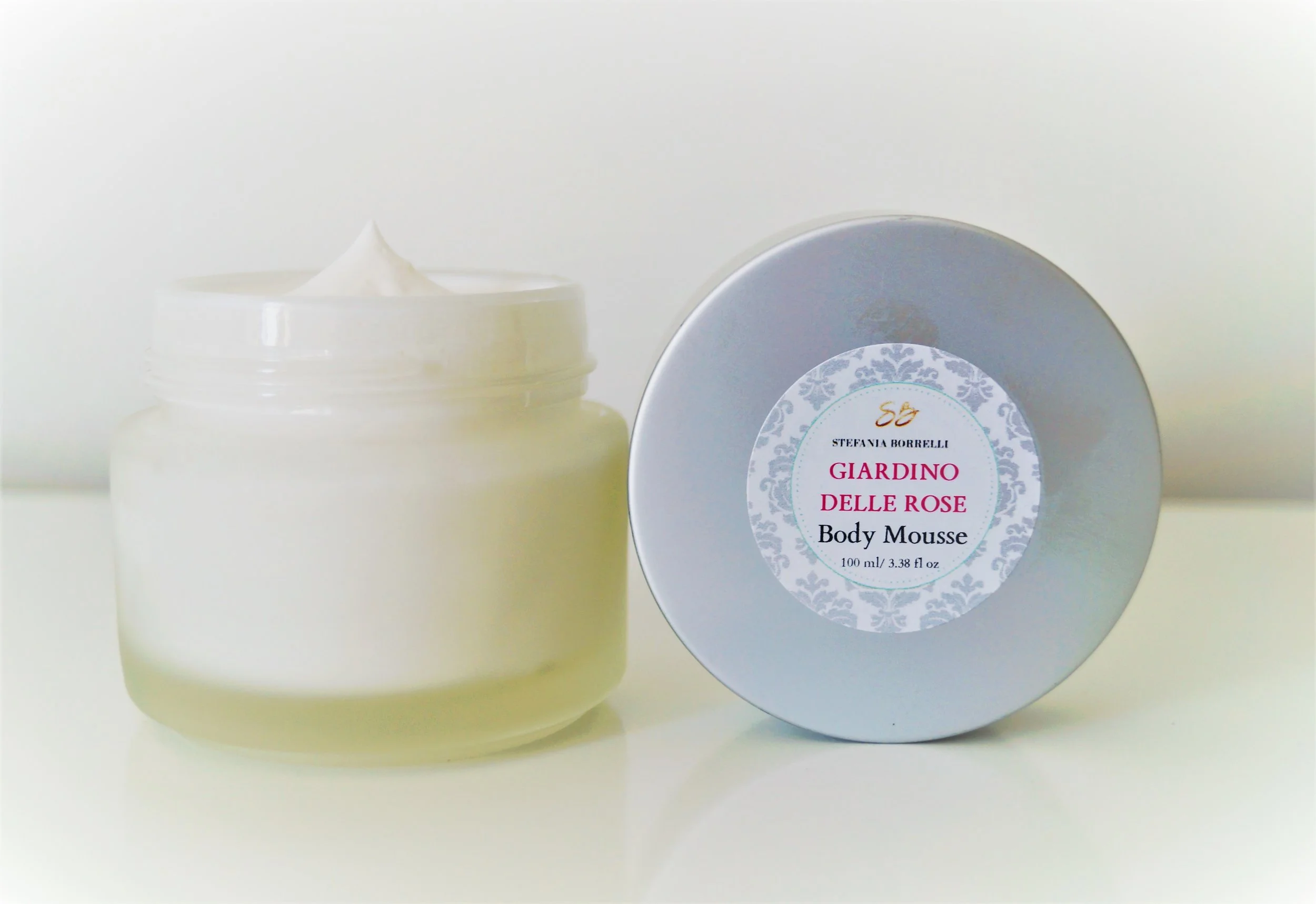 INGREDIENTS: Butyrospermum Parkii (Shea Organic Butter), Orbignya Oleifera (Babassu) Oil , Simmondsia Chinensis (Jojoba) Oil, Camellia oleifera, Carthamus Tinctorius (Safflower) Seed Oil, Oryza sativa, Maranta Arundinacea (Arrowroot) Root Powder, Rosa Damascena (Persian Rose) Essential Oil, Rosa Damascena (Bulgarian Rose Otto), Rosa Alba (Bulgarian White Rose), Rosmarinus officinalis (rosemary) extract, D-Alpha-Tocopherol