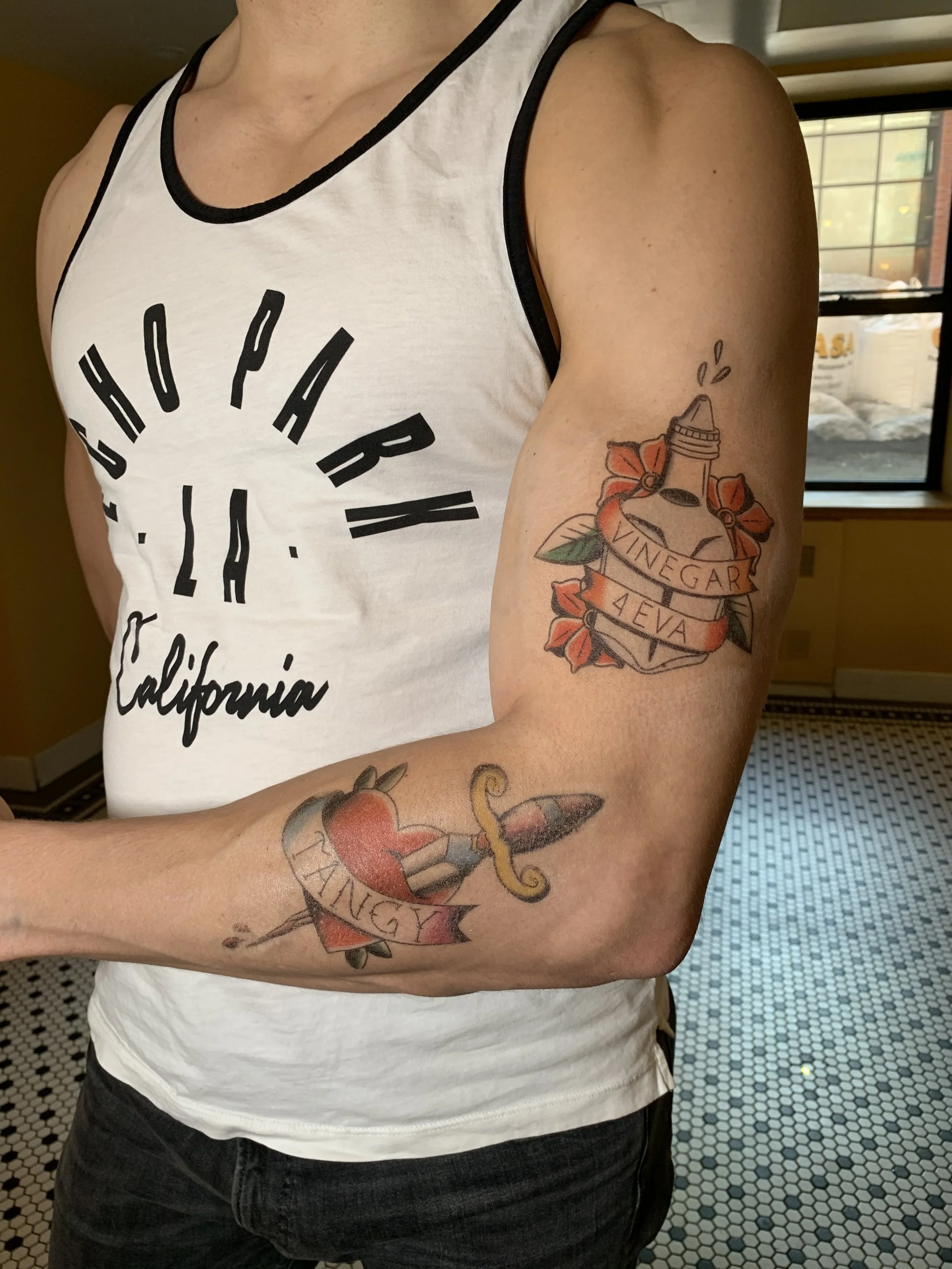  Waterslide tattoo application.  Designed by client. Assisting Jenai Chin.  