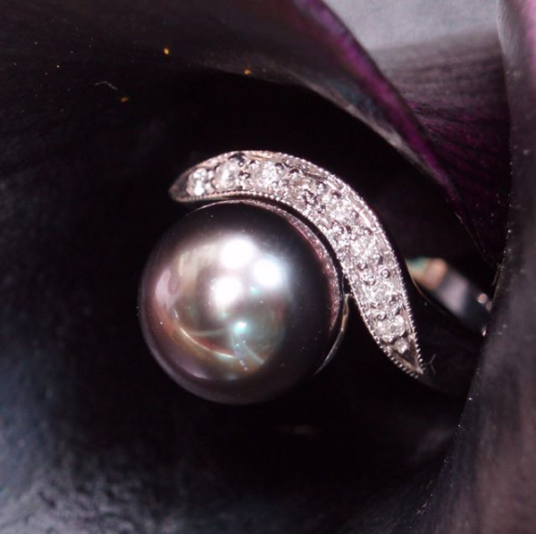 Tahitian Pearl hugged by Diamonds set in 14k White Gold