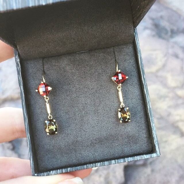 These gorgeous #garnet and #andalusite earrings were custom made by our owner &amp; goldsmith David for a customer&rsquo;s birthday. We love the contrast between the blazing red garnet and verdant andalusite stones. &bull;
&bull;
&bull;
During these 