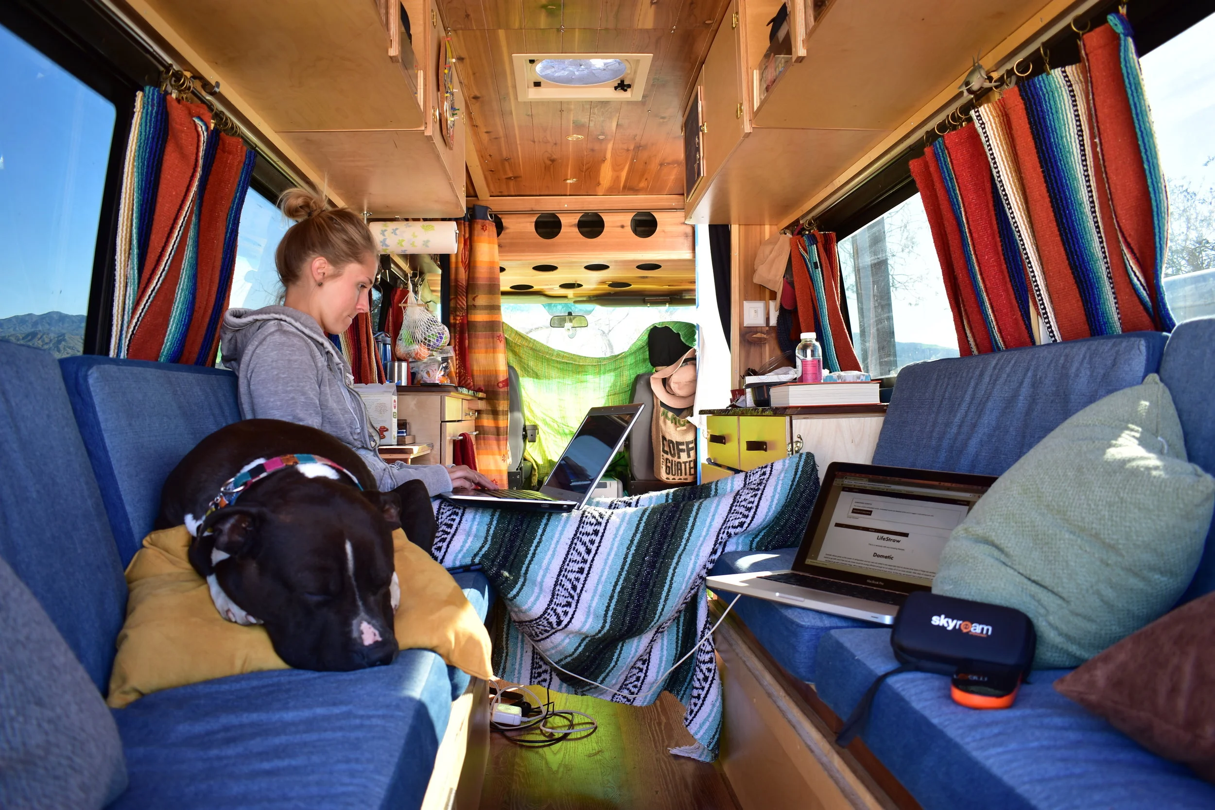 Digital nomads working in the van.