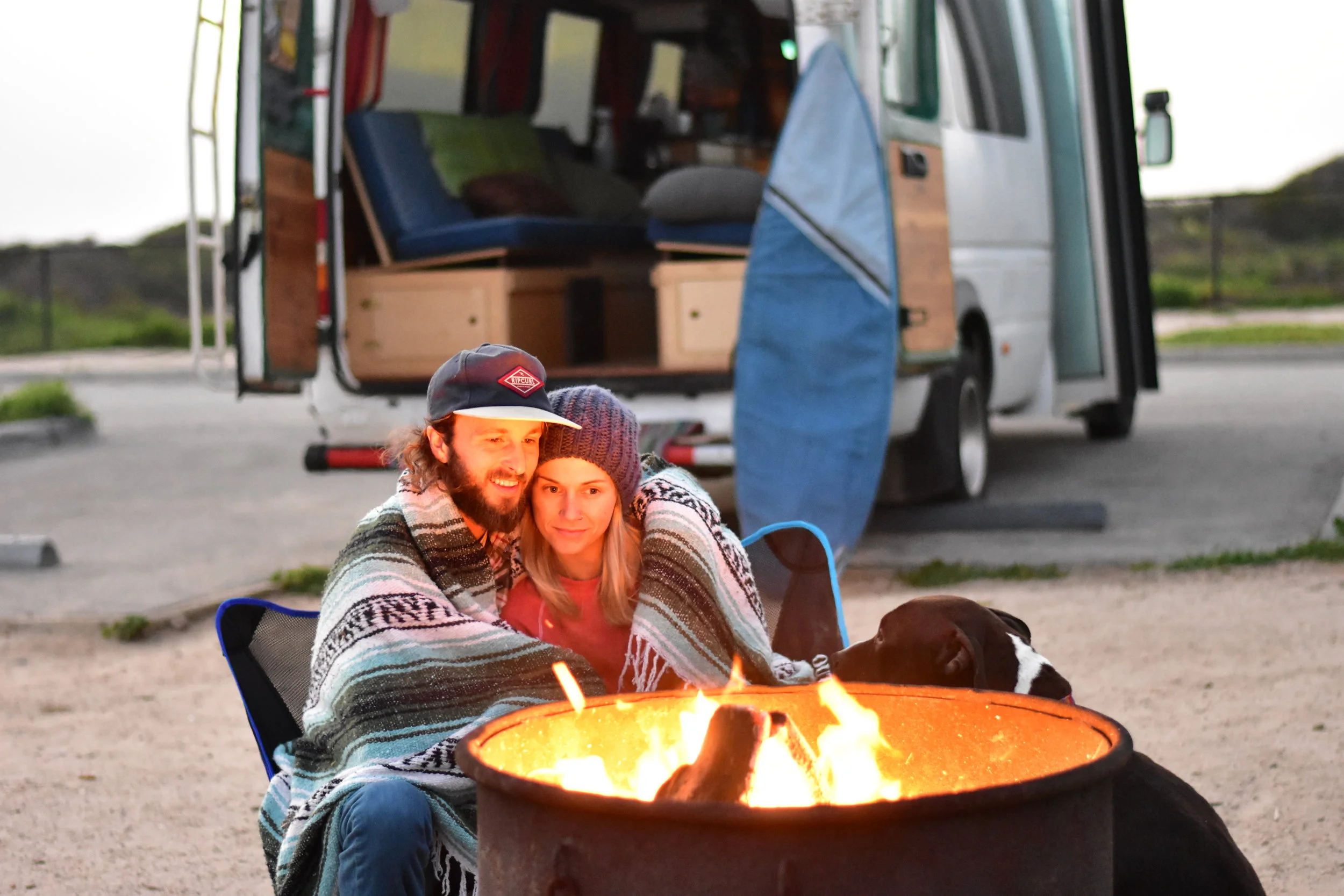 A Vanlife couple having a relationship while traveling in a Sprinter van.