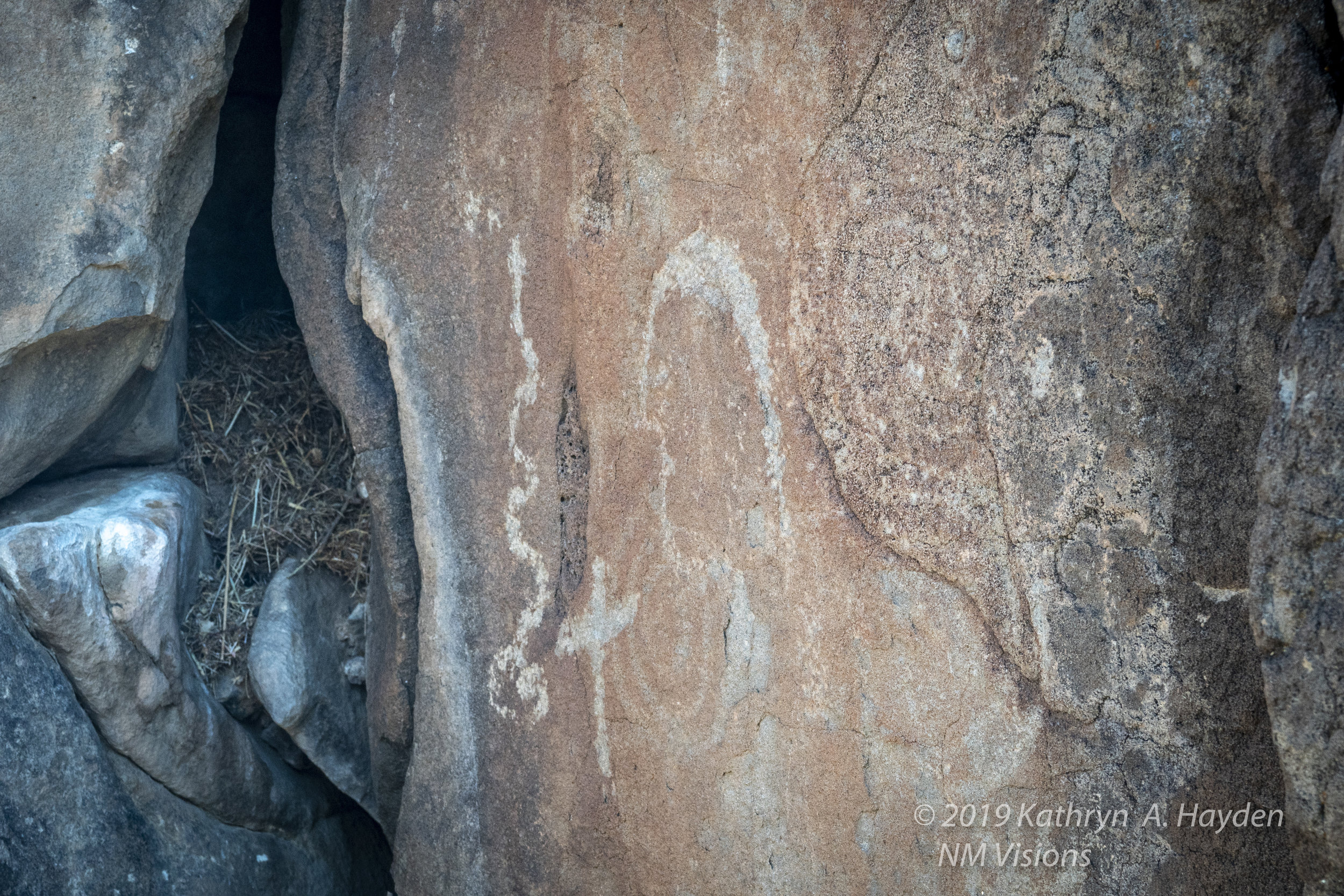  The shepherds would put crosses on some of the rocks with petroglyphs as counter to what they considered pagan art.  And can see the more modern residents have made the crevices their home 