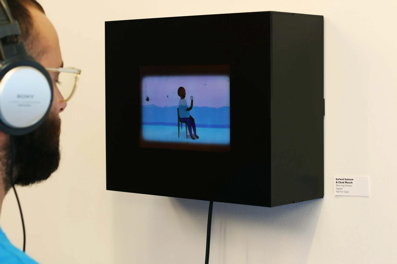 Morning Person is a seamless video loop of a man sipping his cup of coffee as the room fills with water
