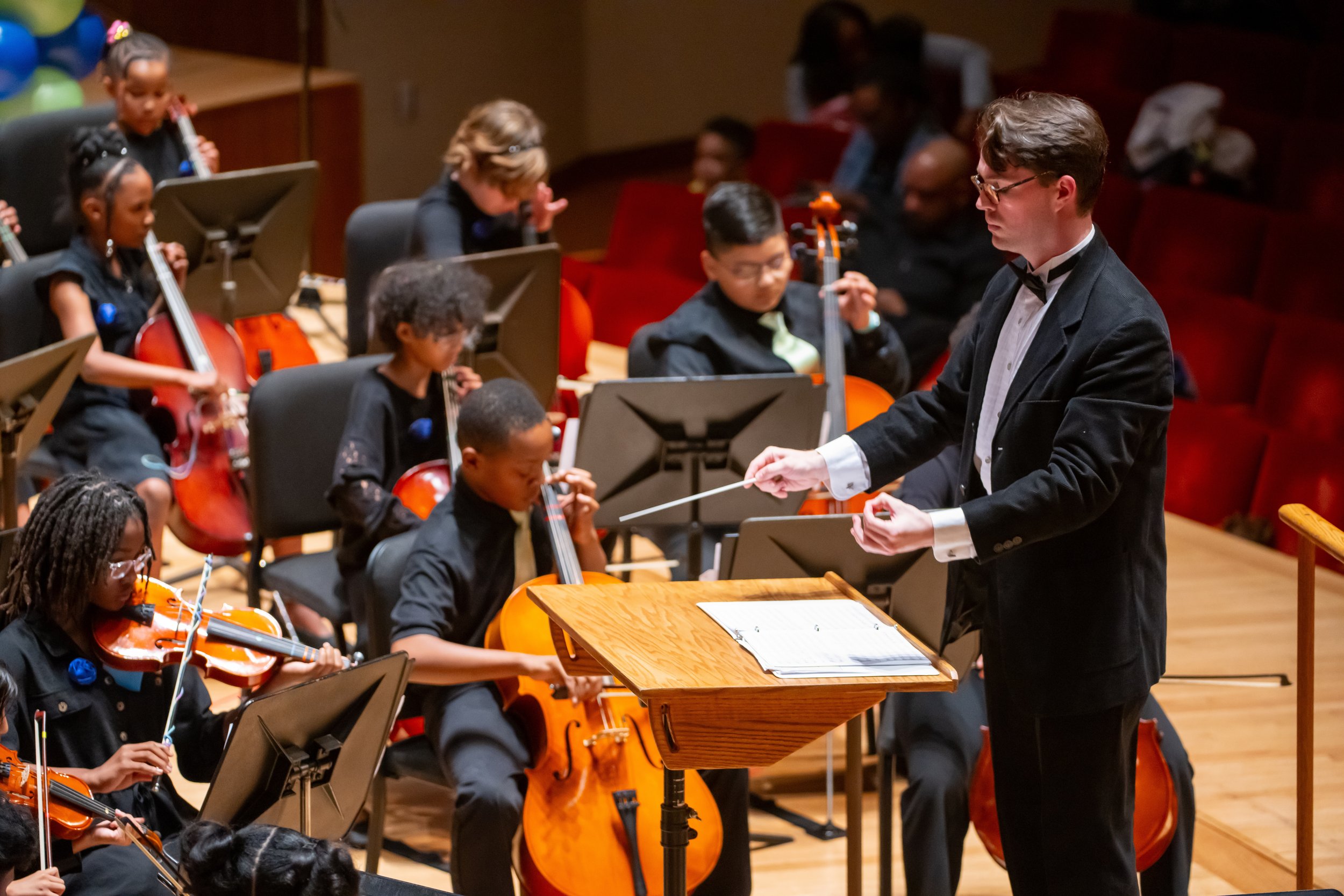 Liam OrchKids Conducting.jpeg