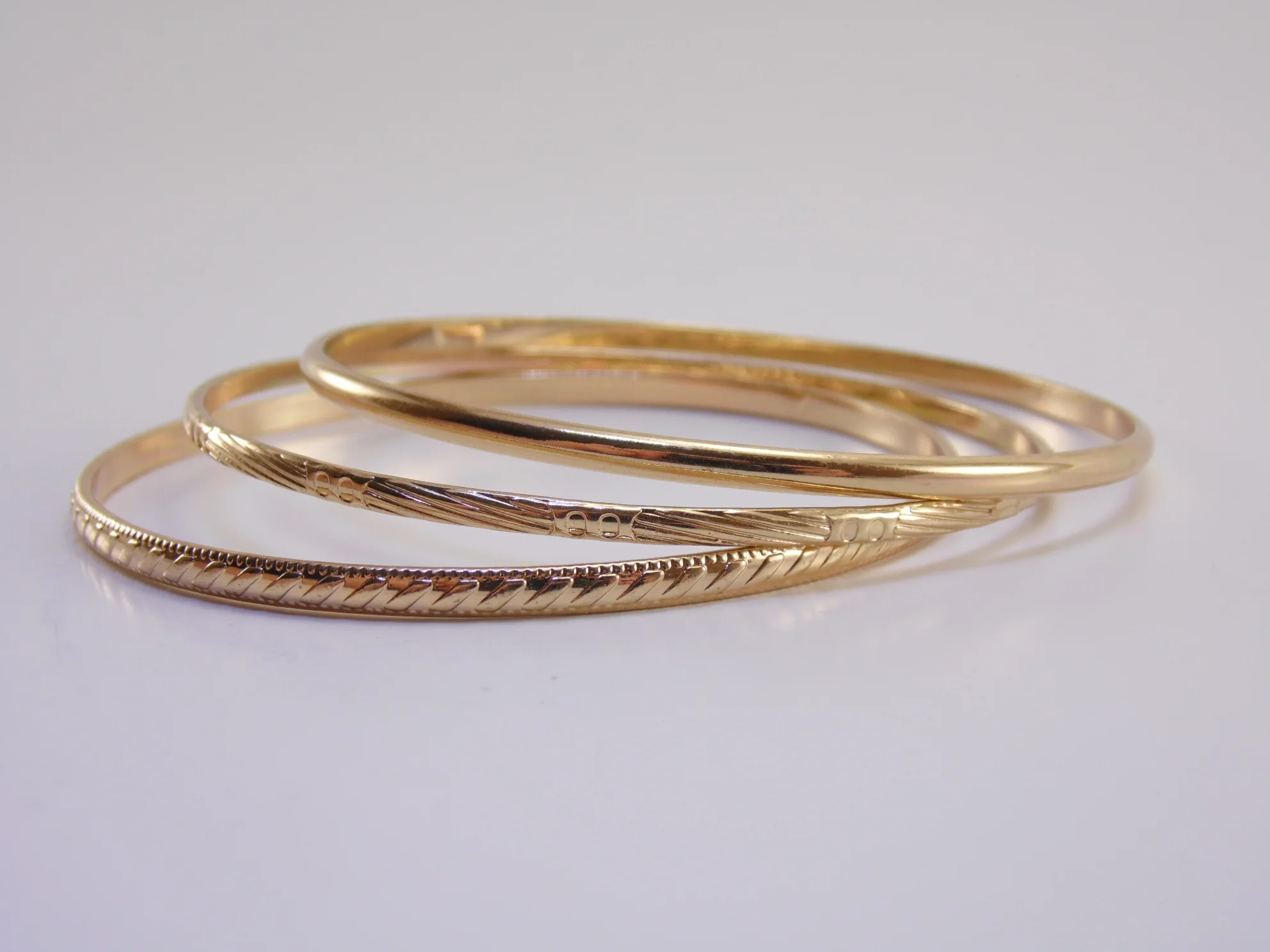 Set of Three Vintage 8" Inch Glimmering Goldtone Circular Round Metal Bangle Bracelets