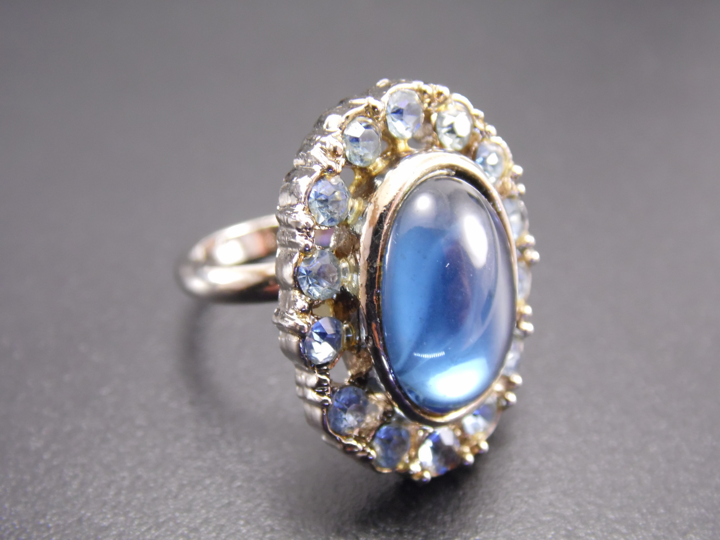 Size 6 Adjustable Silver Tone Blue Faux Cats Eye Moonstone with Blue Rhinestone CZ Accents Vintage Halo Cocktail Statement Ring