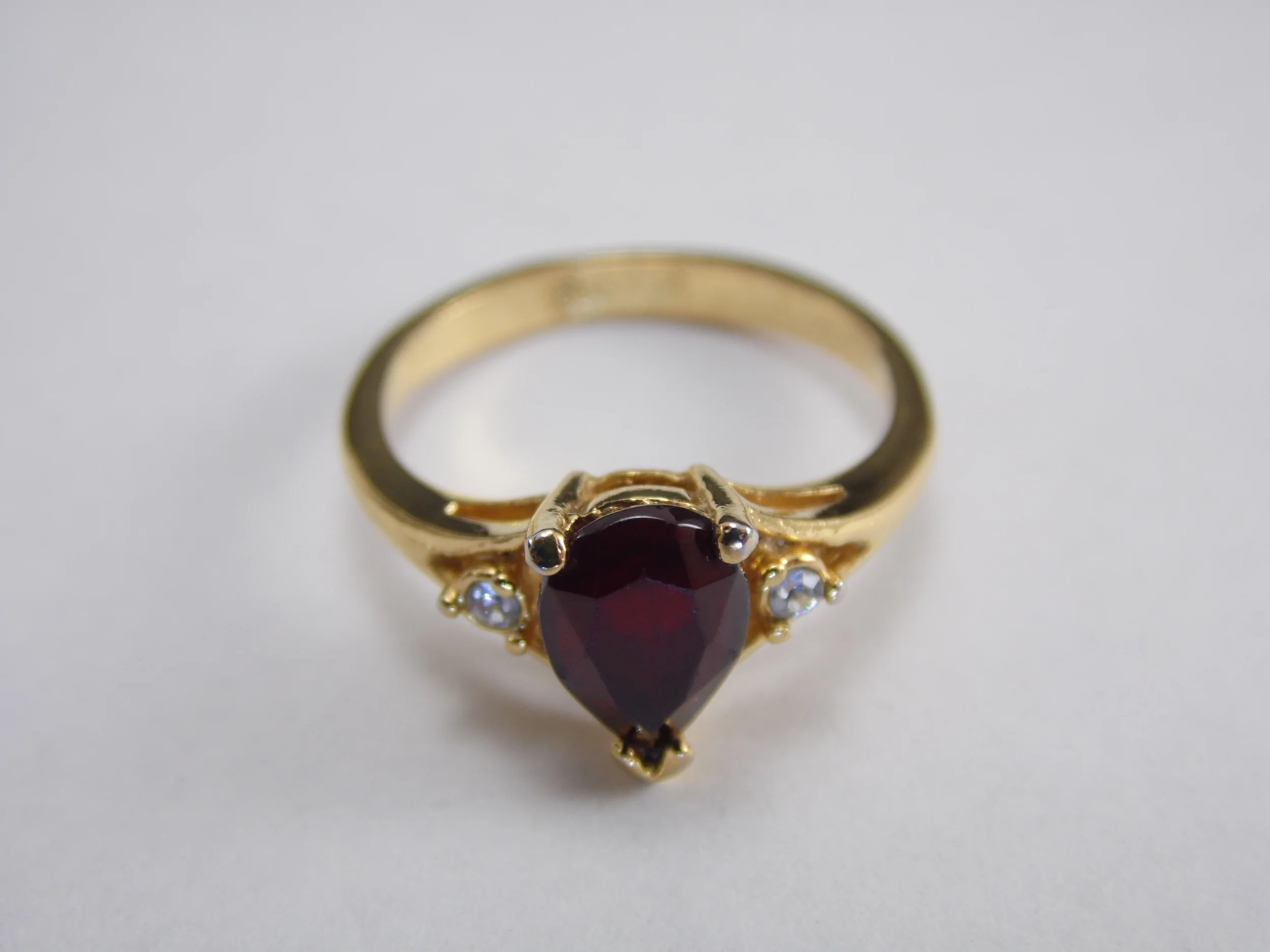 Size 7 Signed "Avon" Gold Tone Pear Cut Red Faux Ruby with Cubic Zirconia CZ Accents Vintage MultiStone Engagement Statement Ring 1.91ct T.W