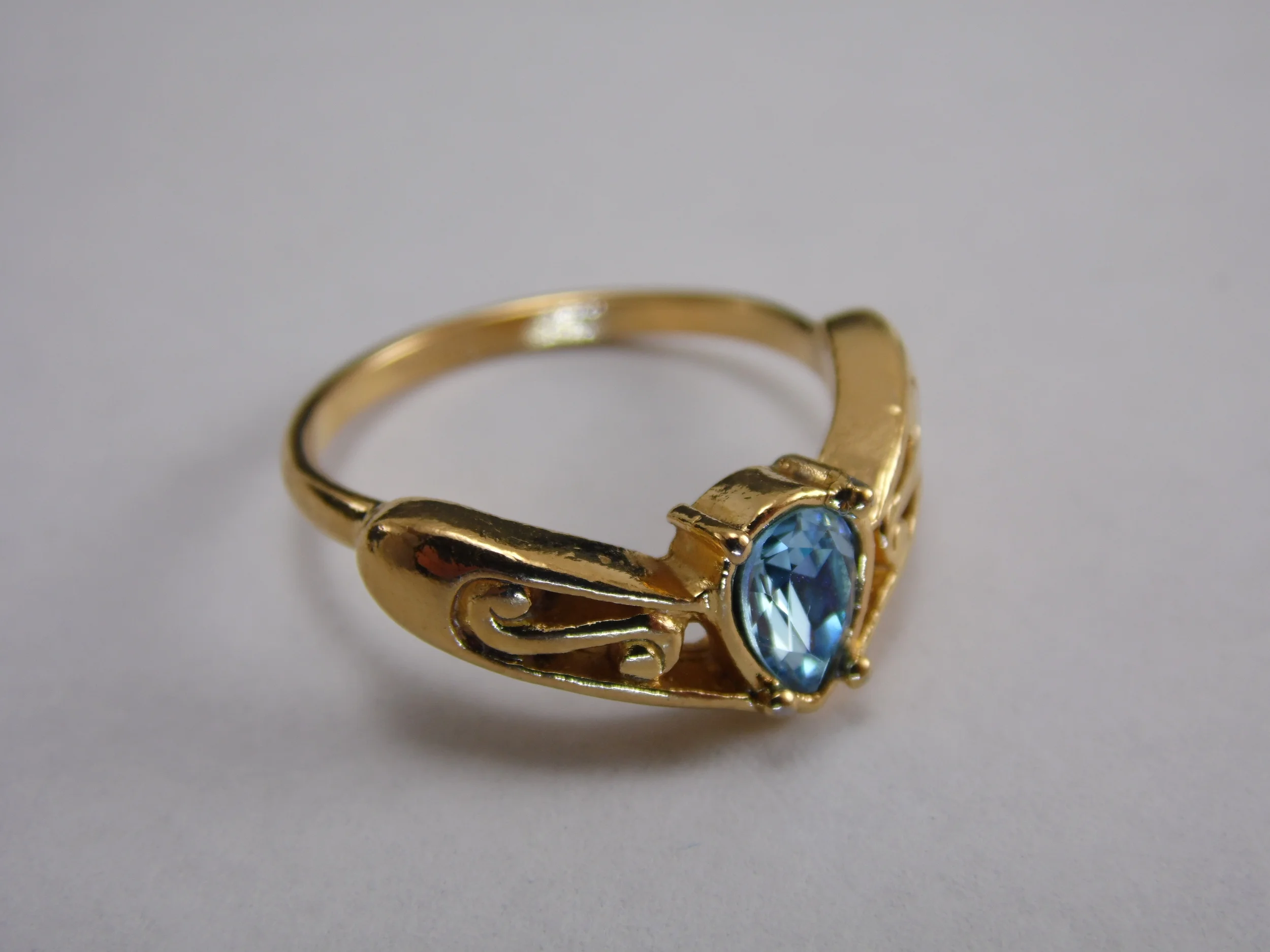 Size 7 Signed "Avon" Gold Plated Faux Blue Pear Cut Sapphire Aquamarine Vintage Filigree Statement Engagement Promise Ring