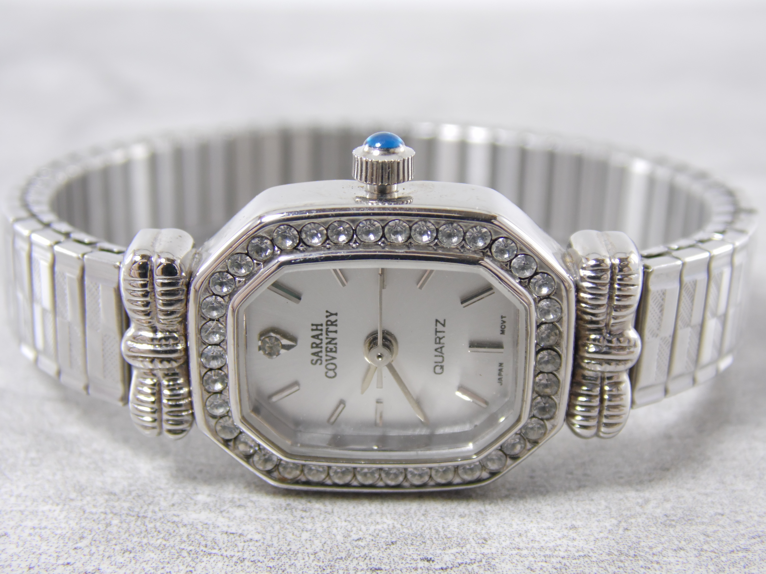 Vintage Sarah Coventry Silver Tone Stainless Cubic Zirconia Bezel Womens Ladies Adjustable Stretch Band Watch