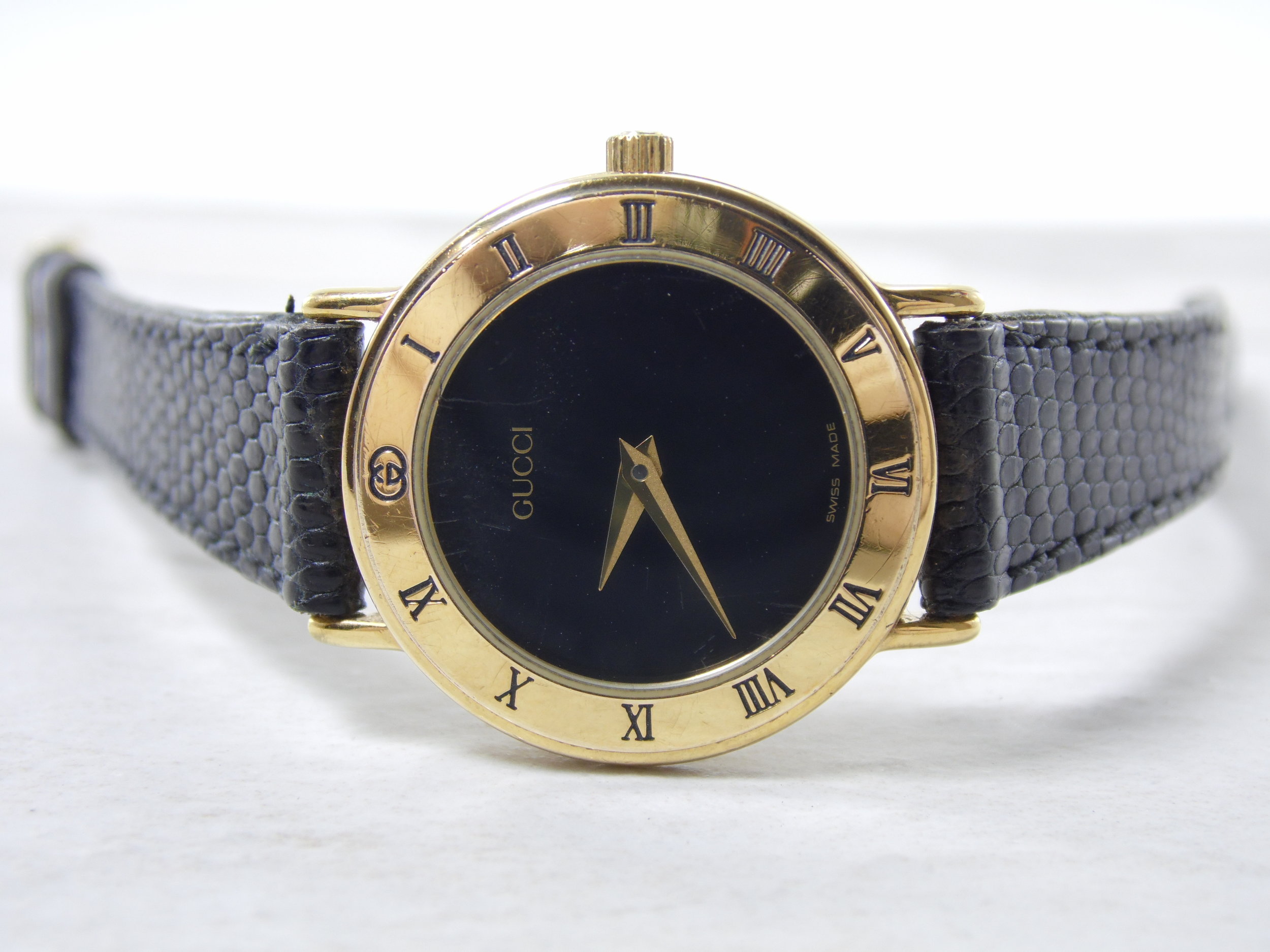 gucci roman numeral watch