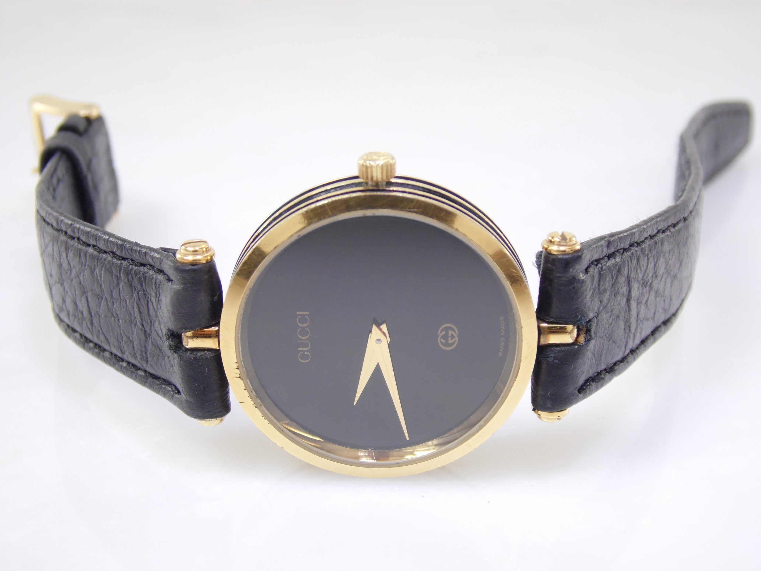 Vintage Black & Gold Authentic Gucci Emblem Mens Womens Swiss Designer Luxury Quartz Stack Watch ETA 561.001